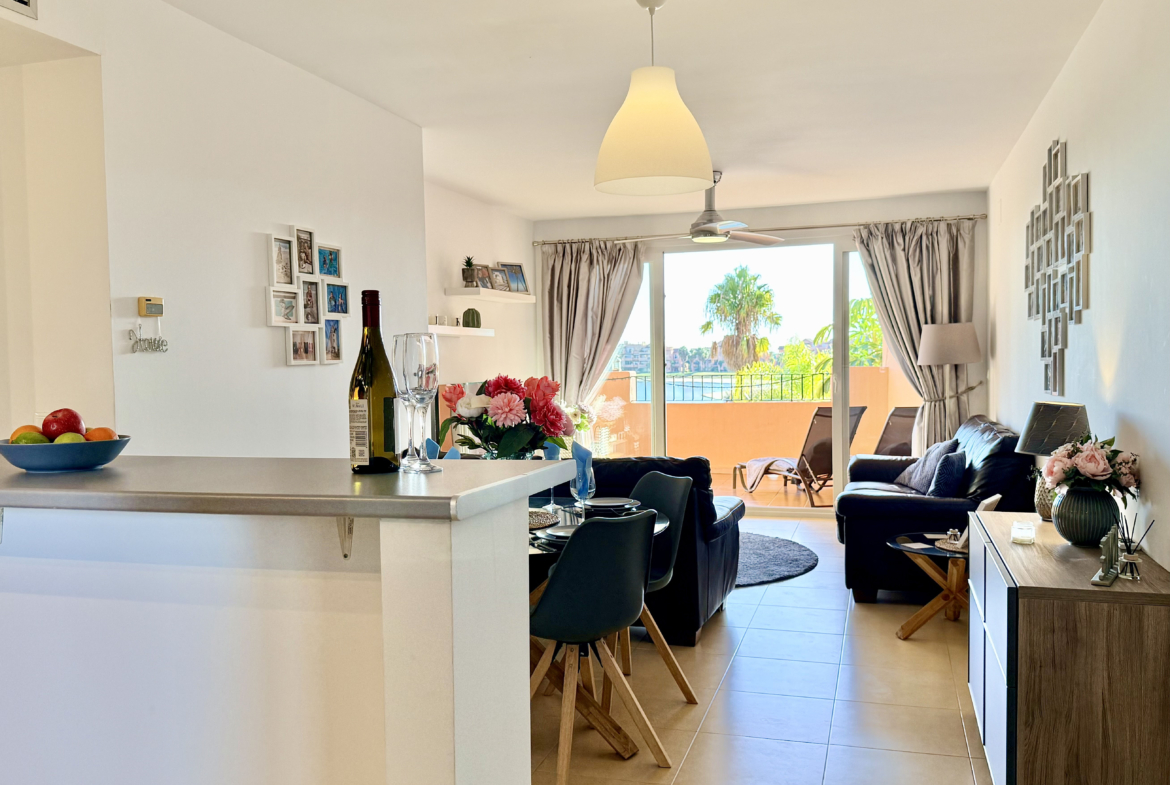 Open plan living and dining area in Mar Menor Golf Resort apartment by Levante Properties