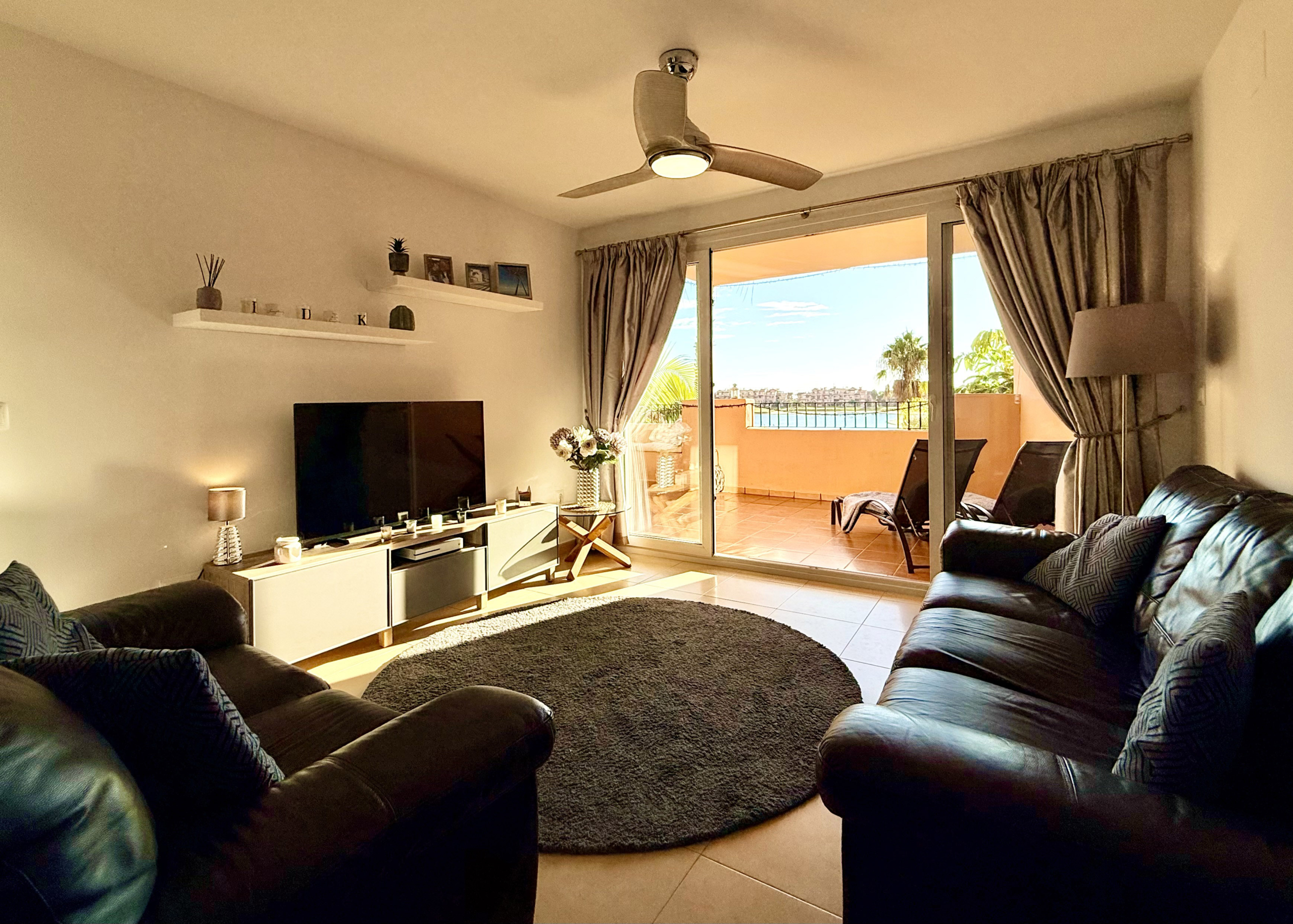 Open plan living and dining area in Mar Menor Golf Resort apartment by Levante Properties