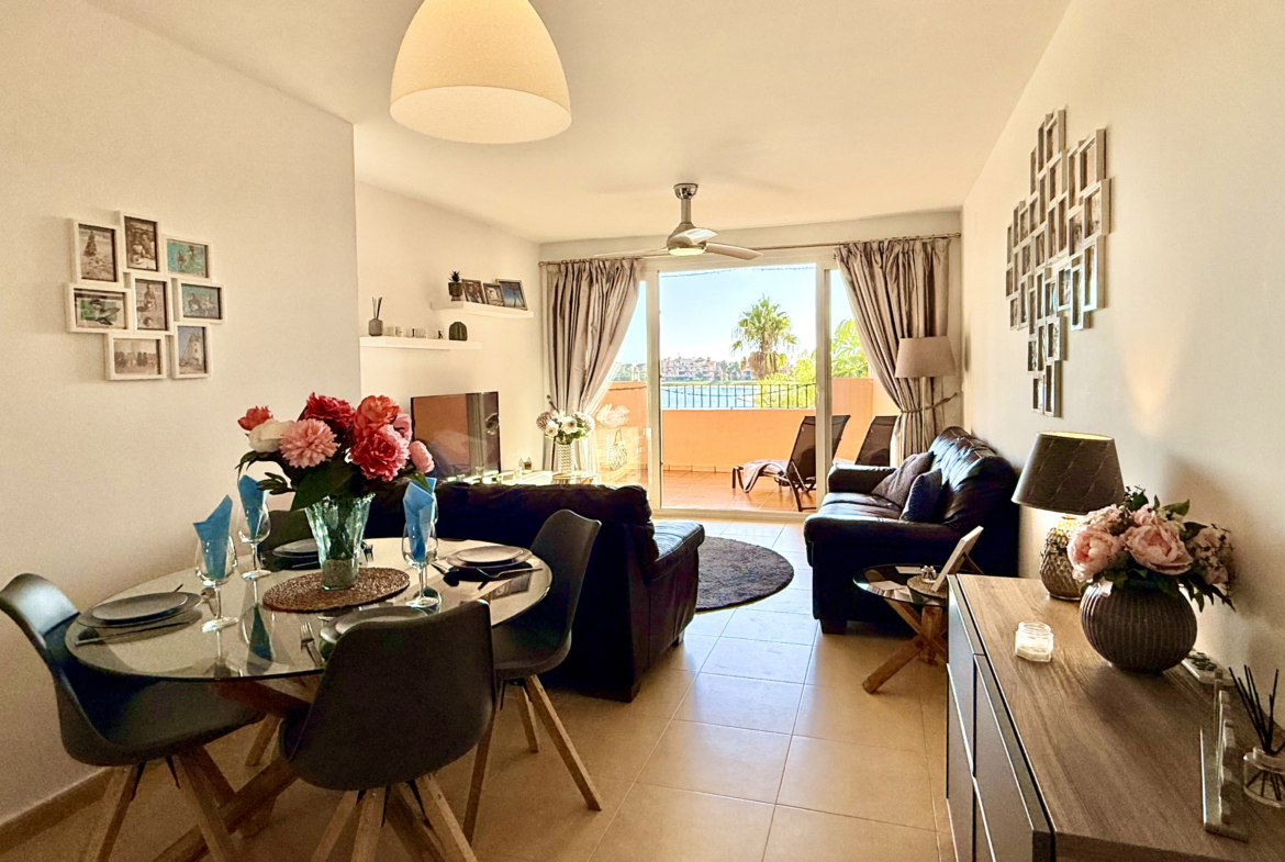 Open plan living and dining area in Mar Menor Golf Resort apartment by Levante Properties