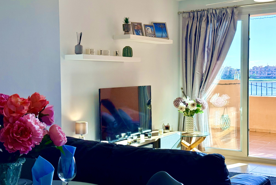 Open plan living and dining area in Mar Menor Golf Resort apartment by Levante Properties