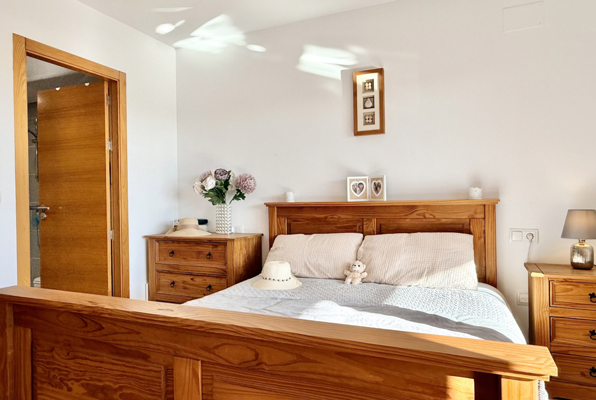 Master bedroom with terrace access at Mar Menor Golf Resort apartment by Levante Properties