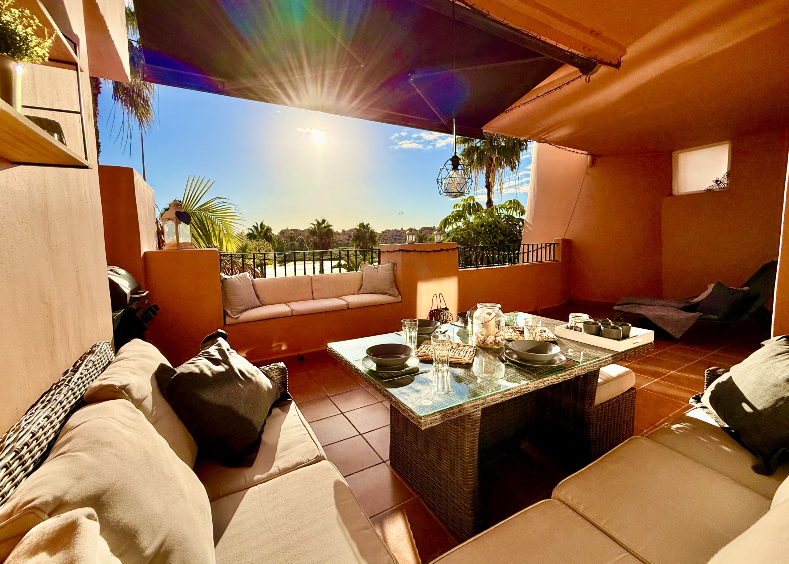 Main terrace with golf, pool and lake views at Mar Menor Golf Resort apartment by Levante Properties