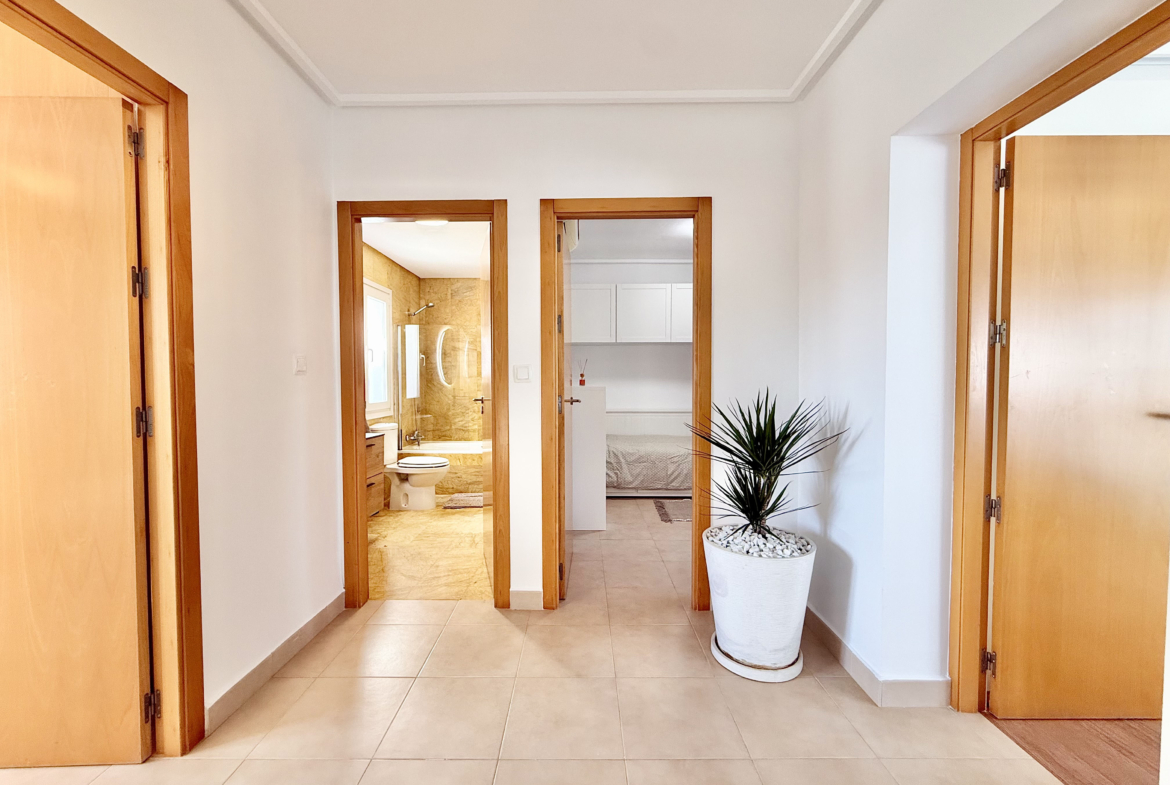 Glass staircase and upper landing in exclusive 4 bed villa for sale on Mar Menor Golf Resort – Levante Properties