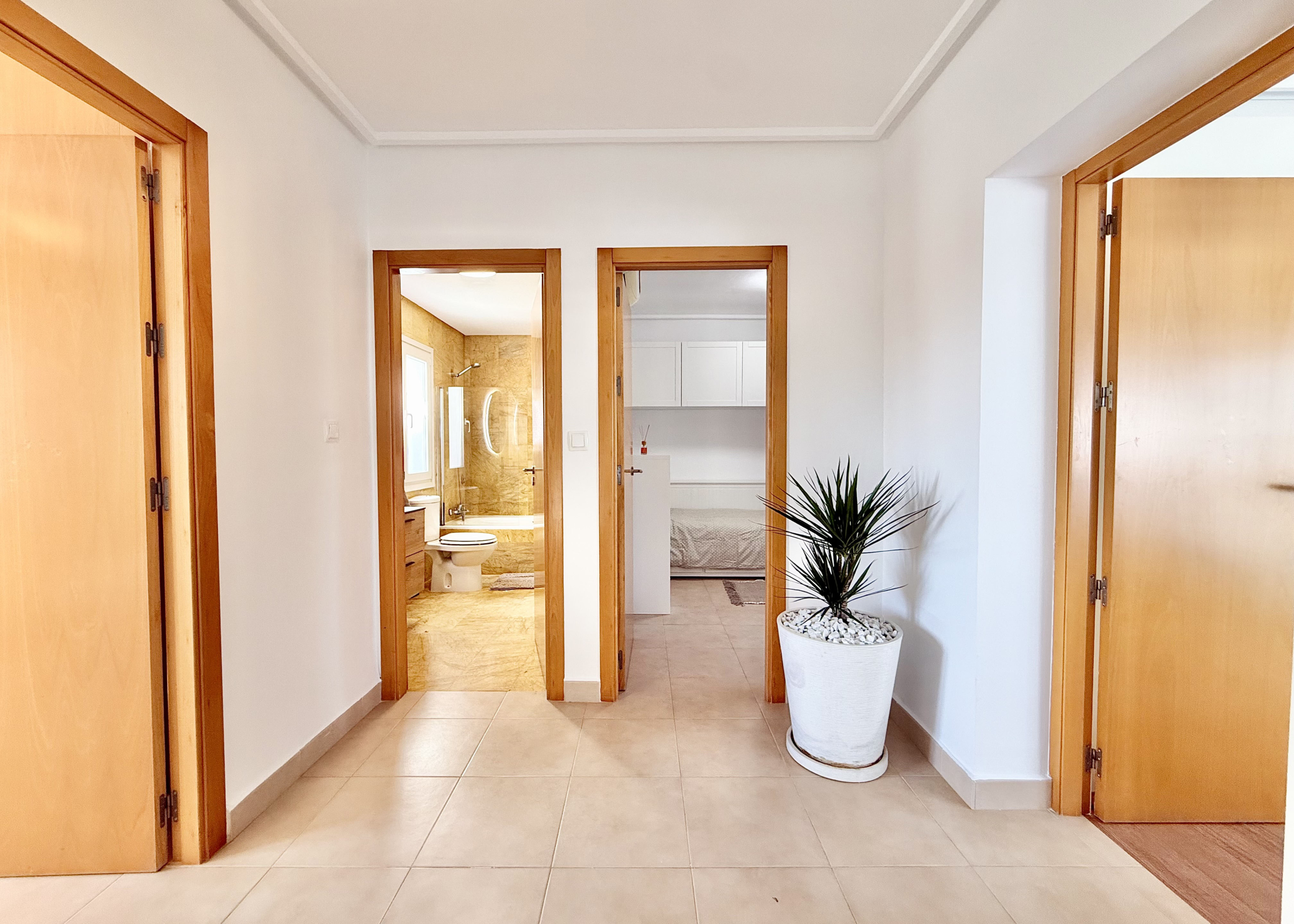 Glass staircase and upper landing in exclusive 4 bed villa for sale on Mar Menor Golf Resort – Levante Properties