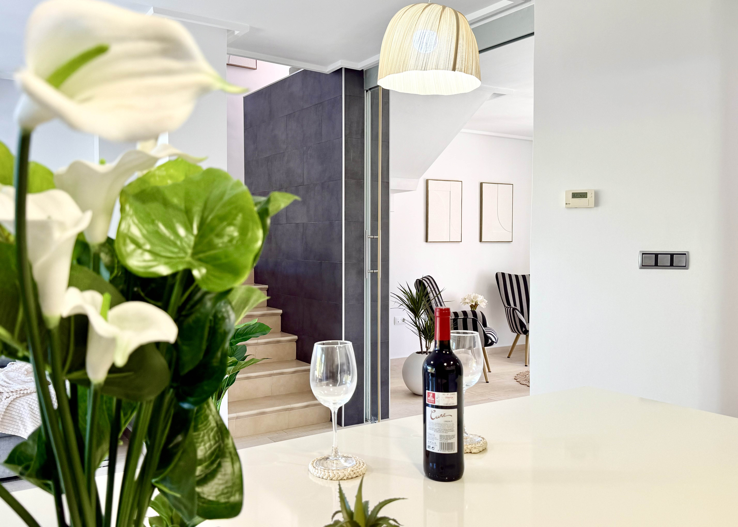 Open-plan kitchen with island in exclusive 4 bed villa for sale on Mar Menor Golf Resort – Levante Properties