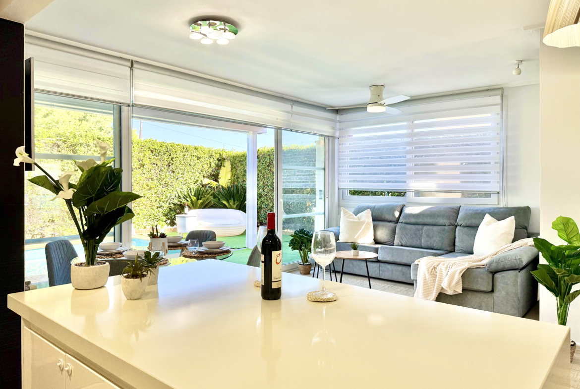 Open-plan kitchen with island in exclusive 4 bed villa for sale on Mar Menor Golf Resort – Levante Properties
