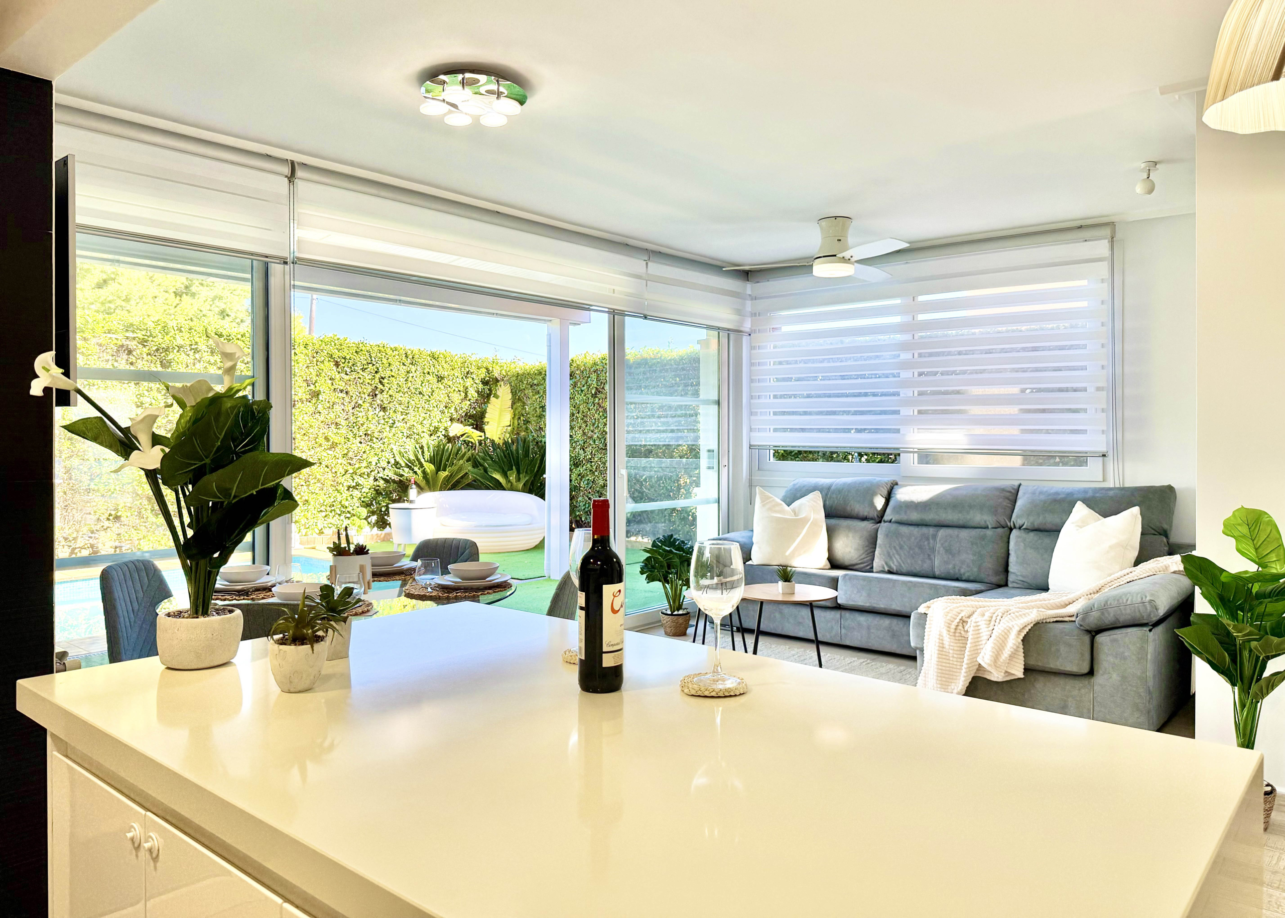 Open-plan kitchen with island in exclusive 4 bed villa for sale on Mar Menor Golf Resort – Levante Properties