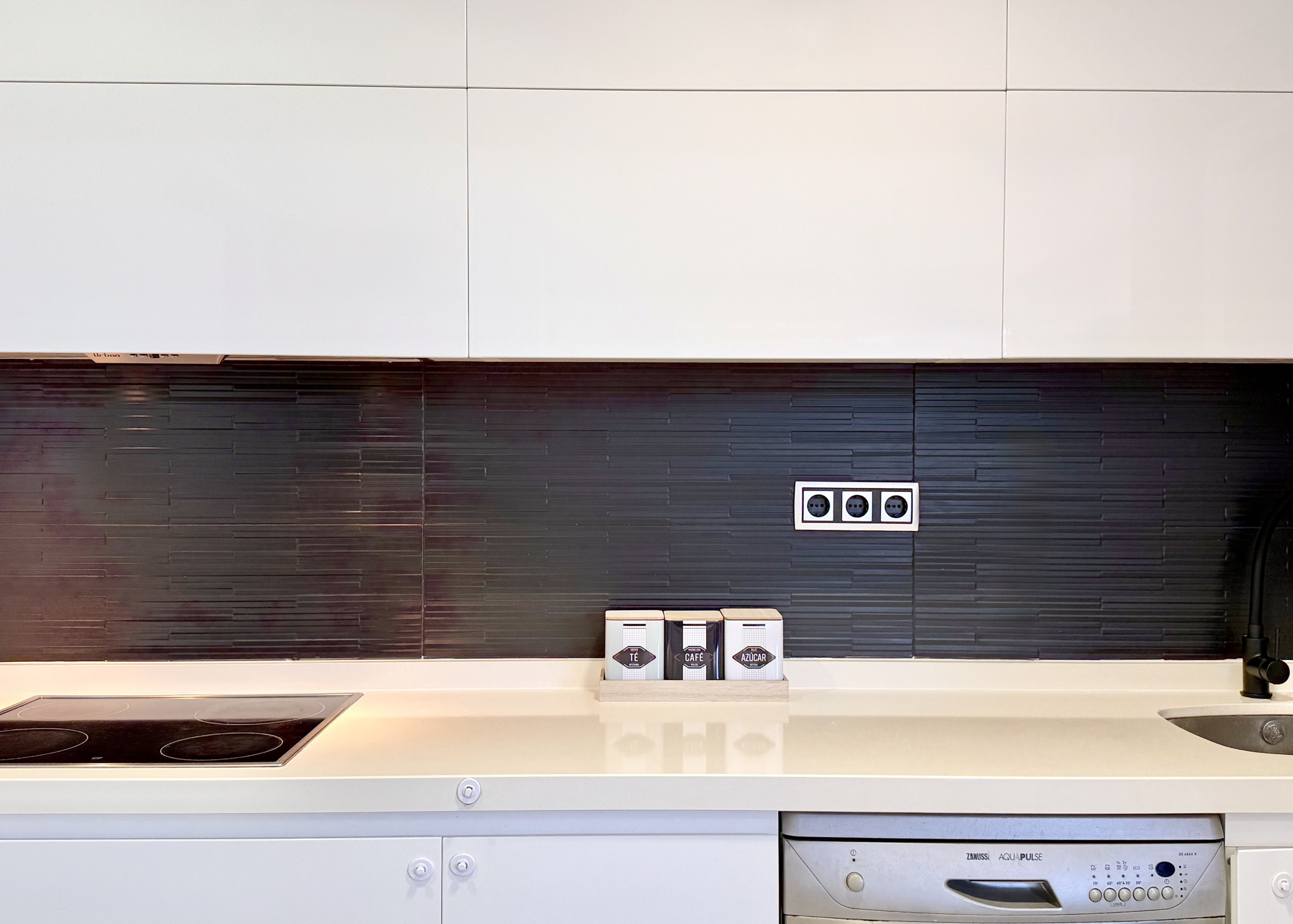 Open-plan kitchen with island in exclusive 4 bed villa for sale on Mar Menor Golf Resort – Levante Properties