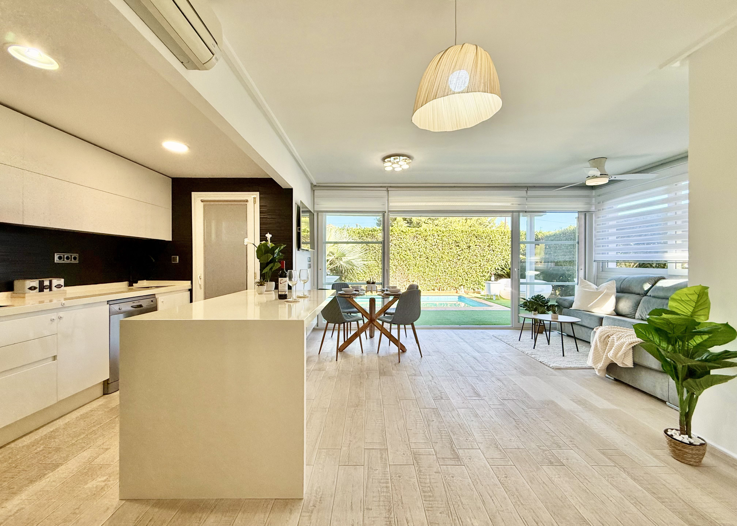 Open-plan living spaces in exclusive 4 bed villa for sale on Mar Menor Golf Resort – Levante Properties