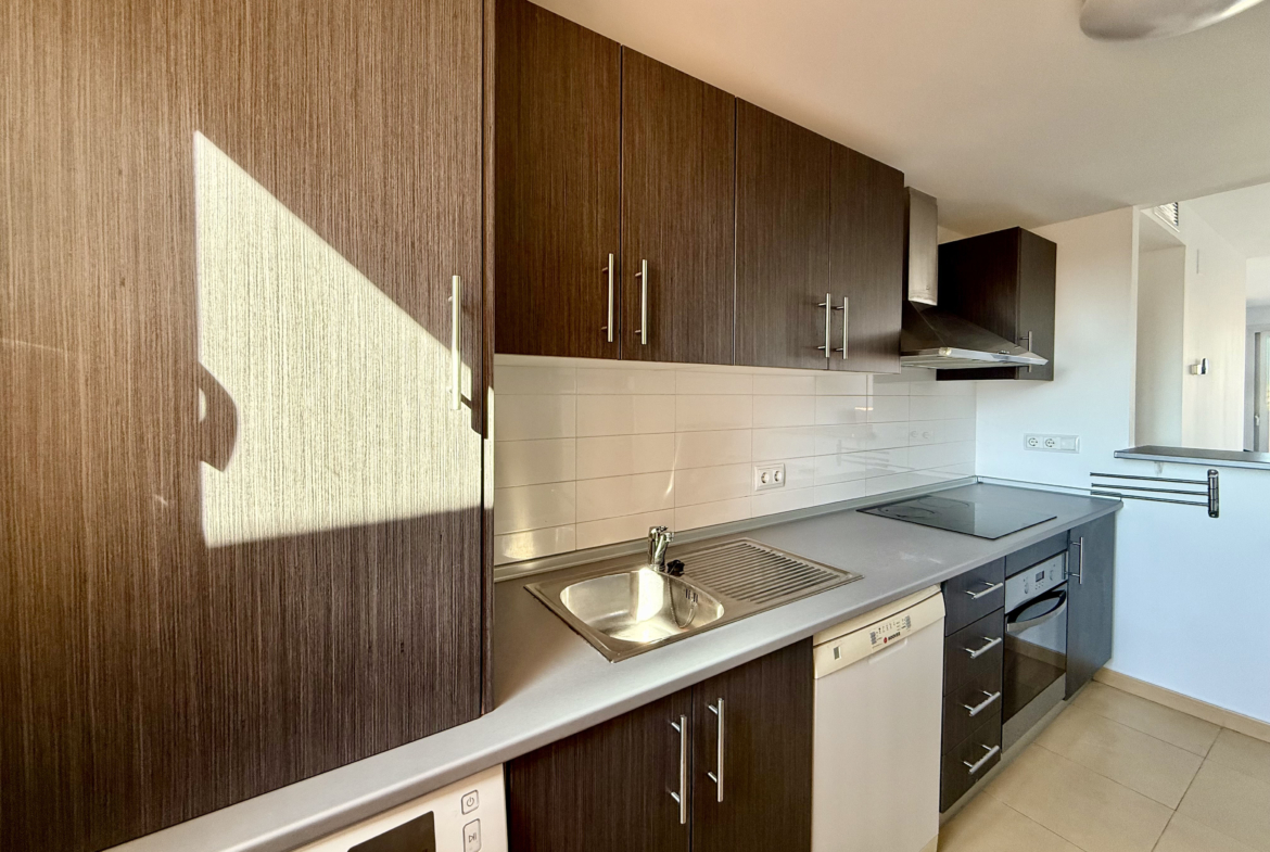 Fully fitted kitchen in two bedroom penthouse at Mar Menor Golf Resort by Levante Properties