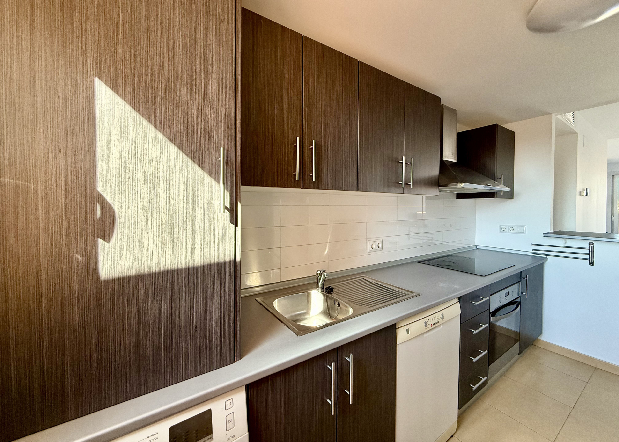 Fully fitted kitchen in two bedroom penthouse at Mar Menor Golf Resort by Levante Properties