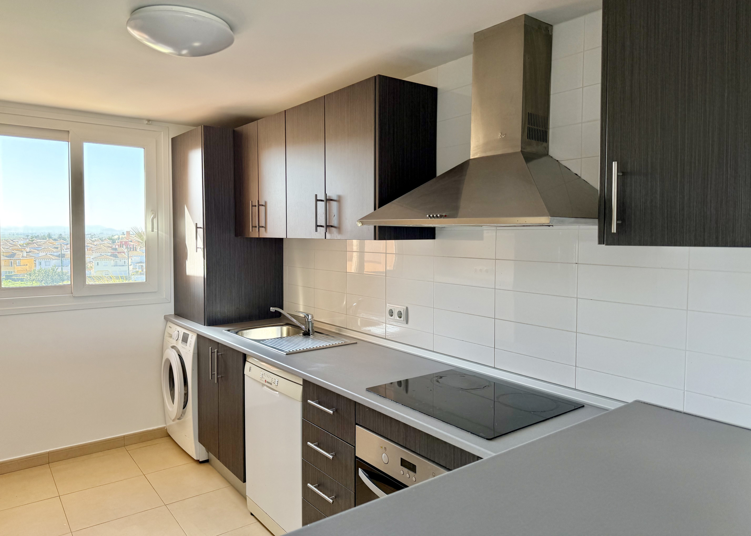 Fully fitted kitchen in two bedroom penthouse at Mar Menor Golf Resort by Levante Properties