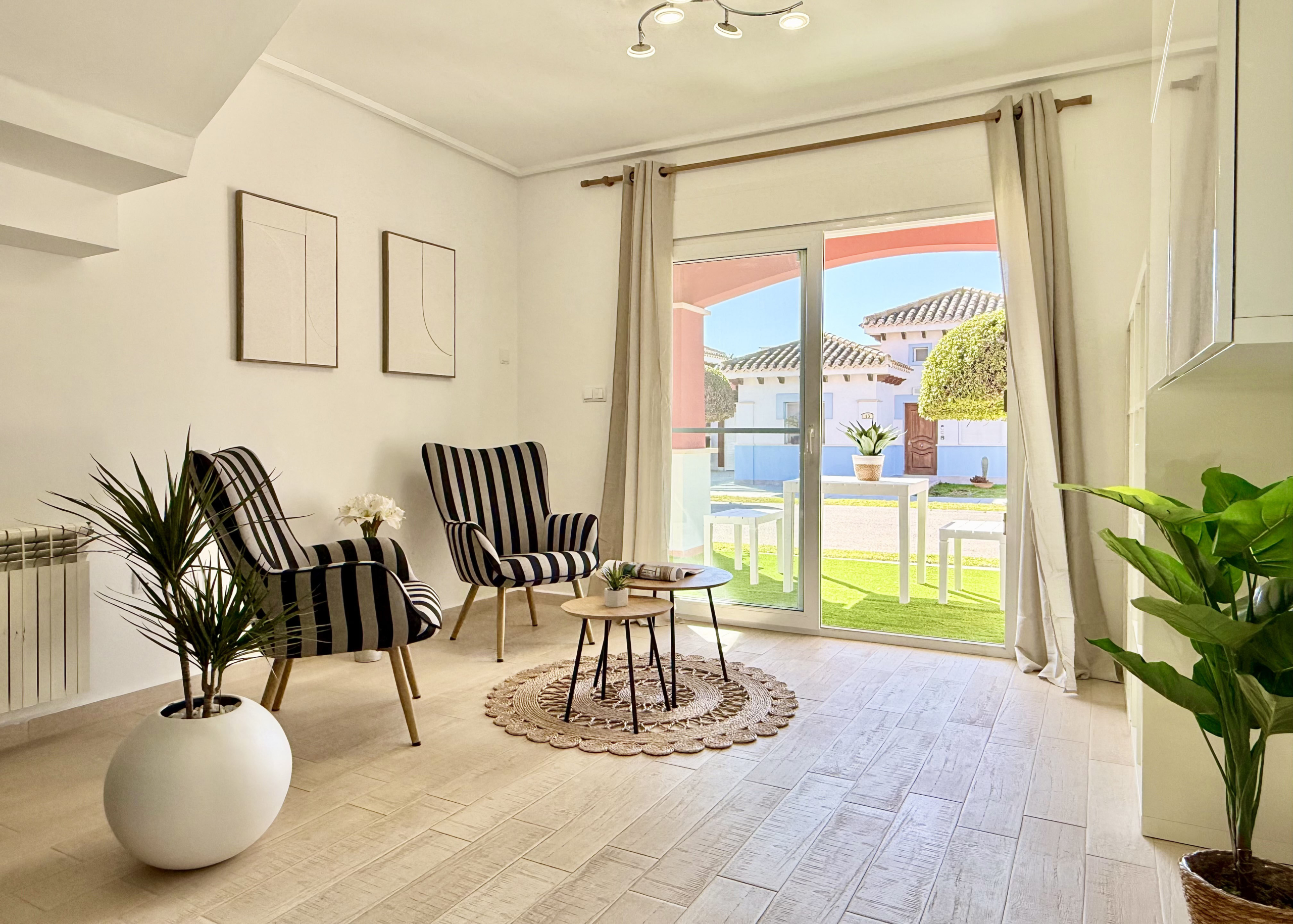Open-plan living spaces in exclusive 4 bed villa for sale on Mar Menor Golf Resort – Levante Properties