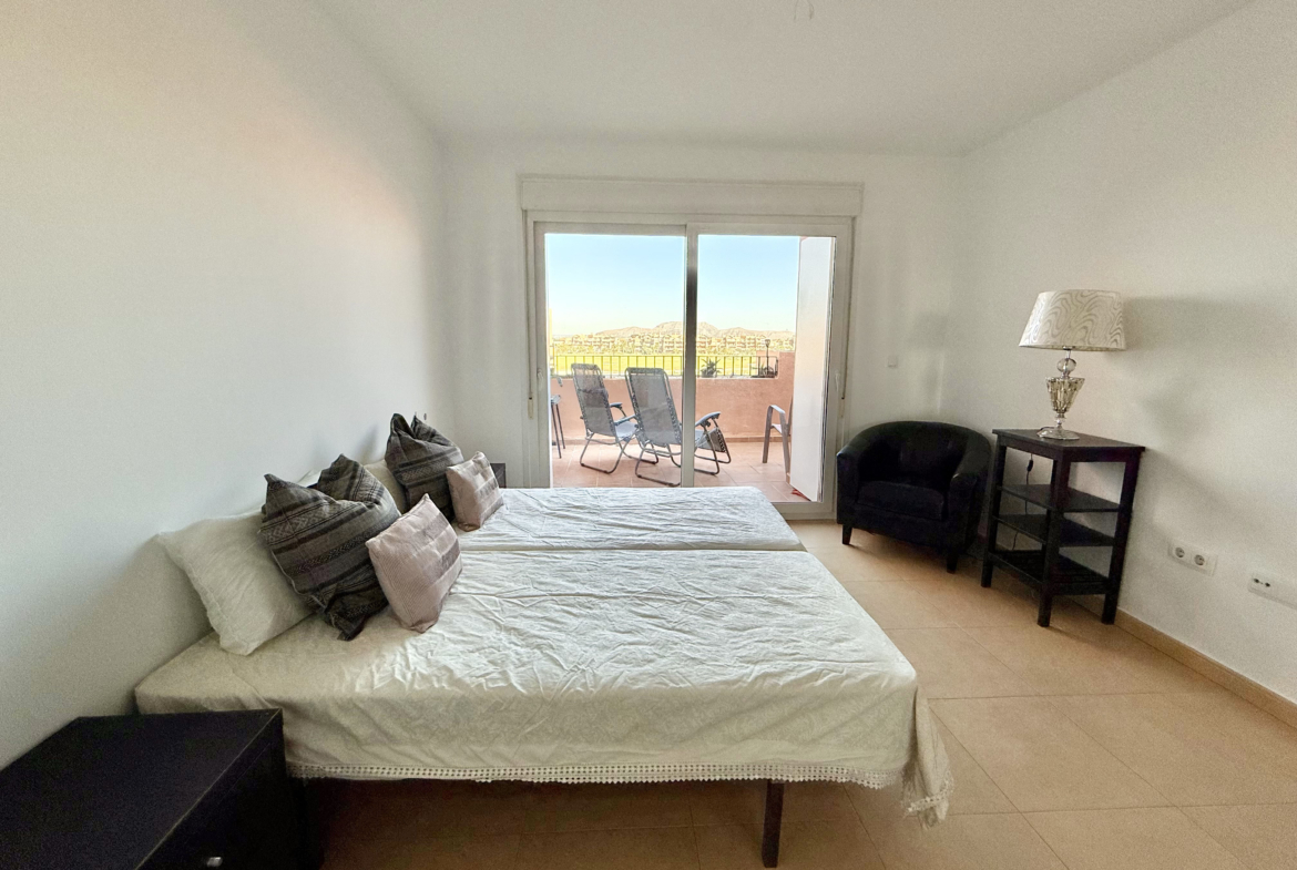 Master bedroom with terrace access in penthouse at Mar Menor Golf Resort Levante Properties