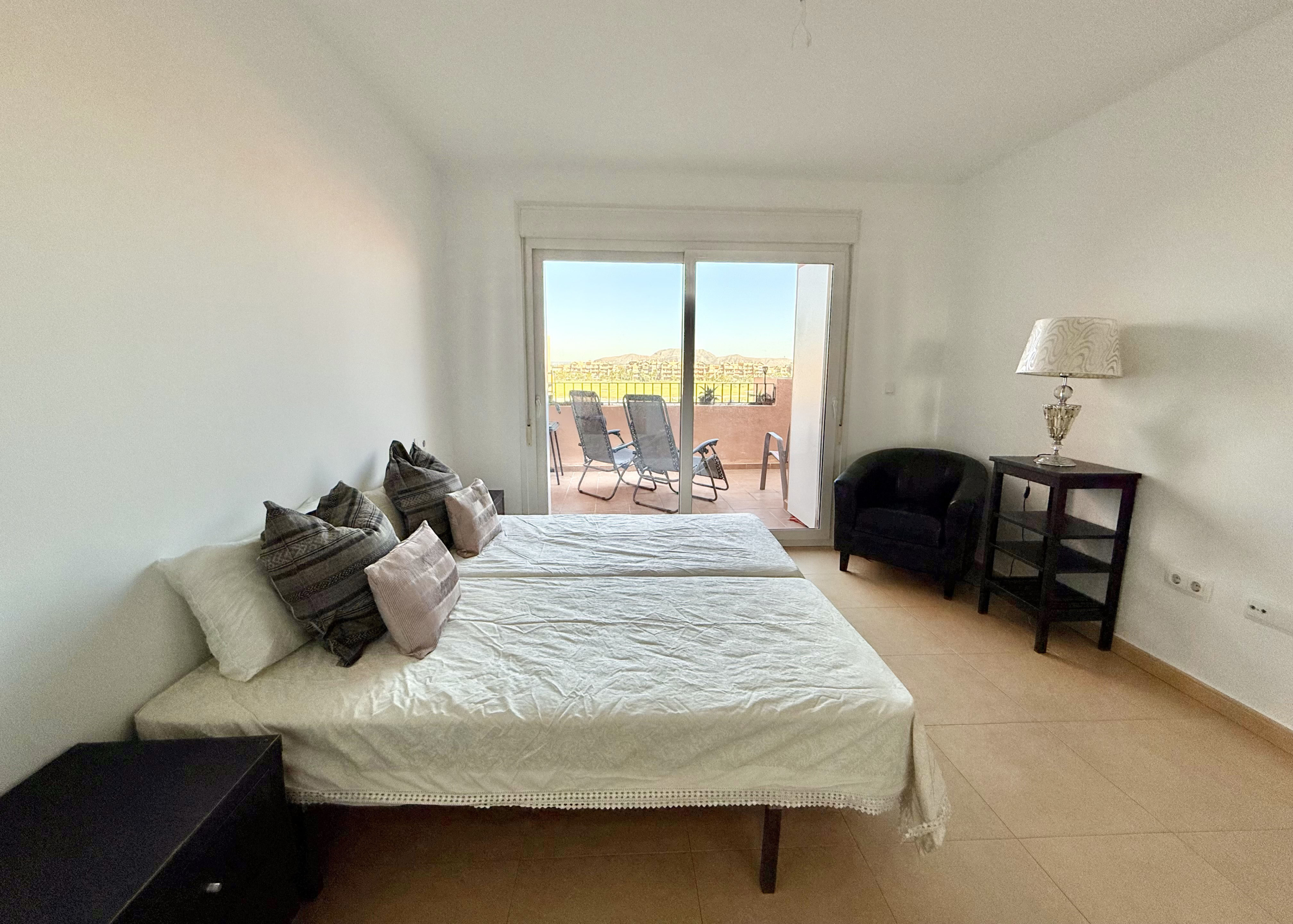 Master bedroom with terrace access in penthouse at Mar Menor Golf Resort Levante Properties