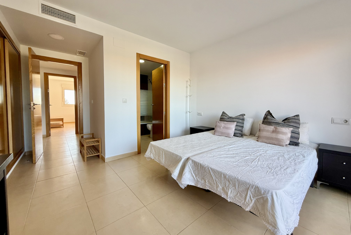 Master bedroom with terrace access in penthouse at Mar Menor Golf Resort Levante Properties