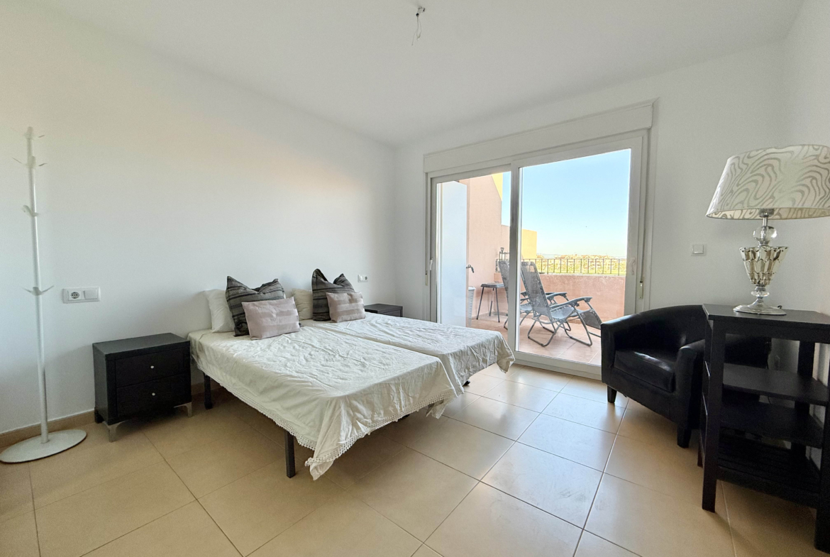 Master bedroom with terrace access in penthouse at Mar Menor Golf Resort Levante Properties