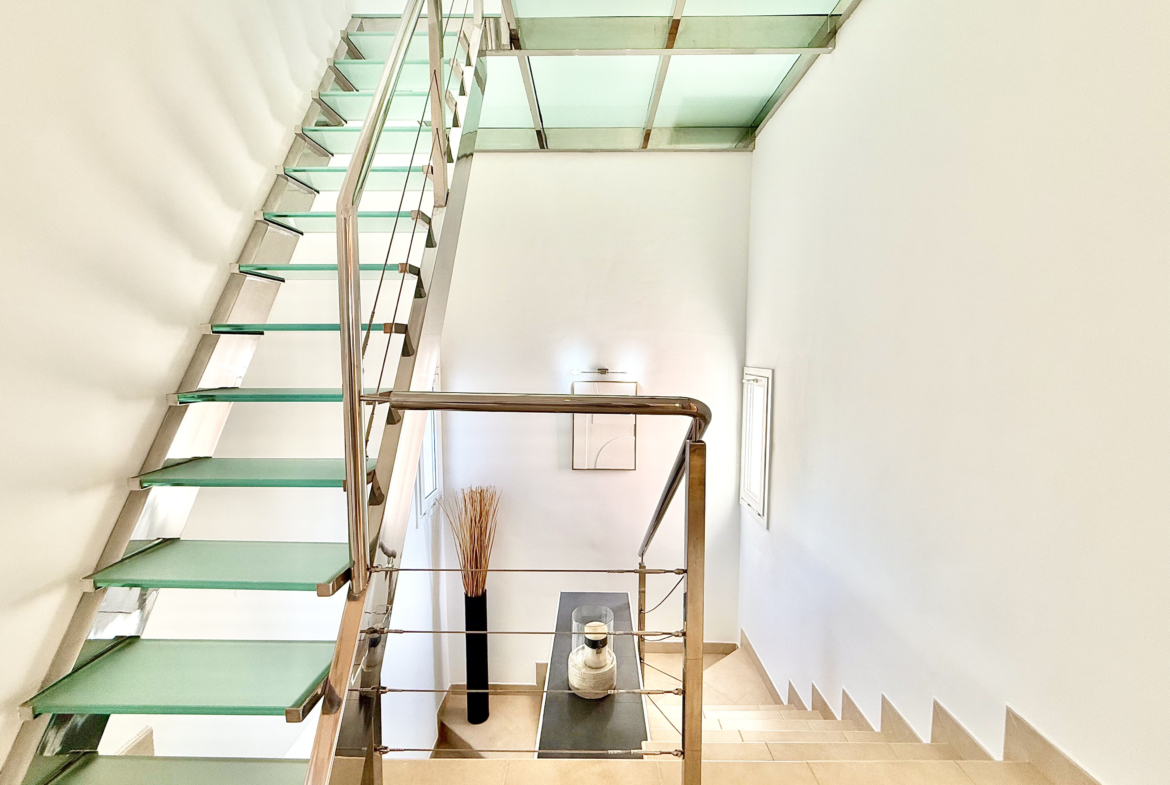 Feature staircase in upgraded 4 bedroom villa on Mar Menor Golf Resort – Levante Properties