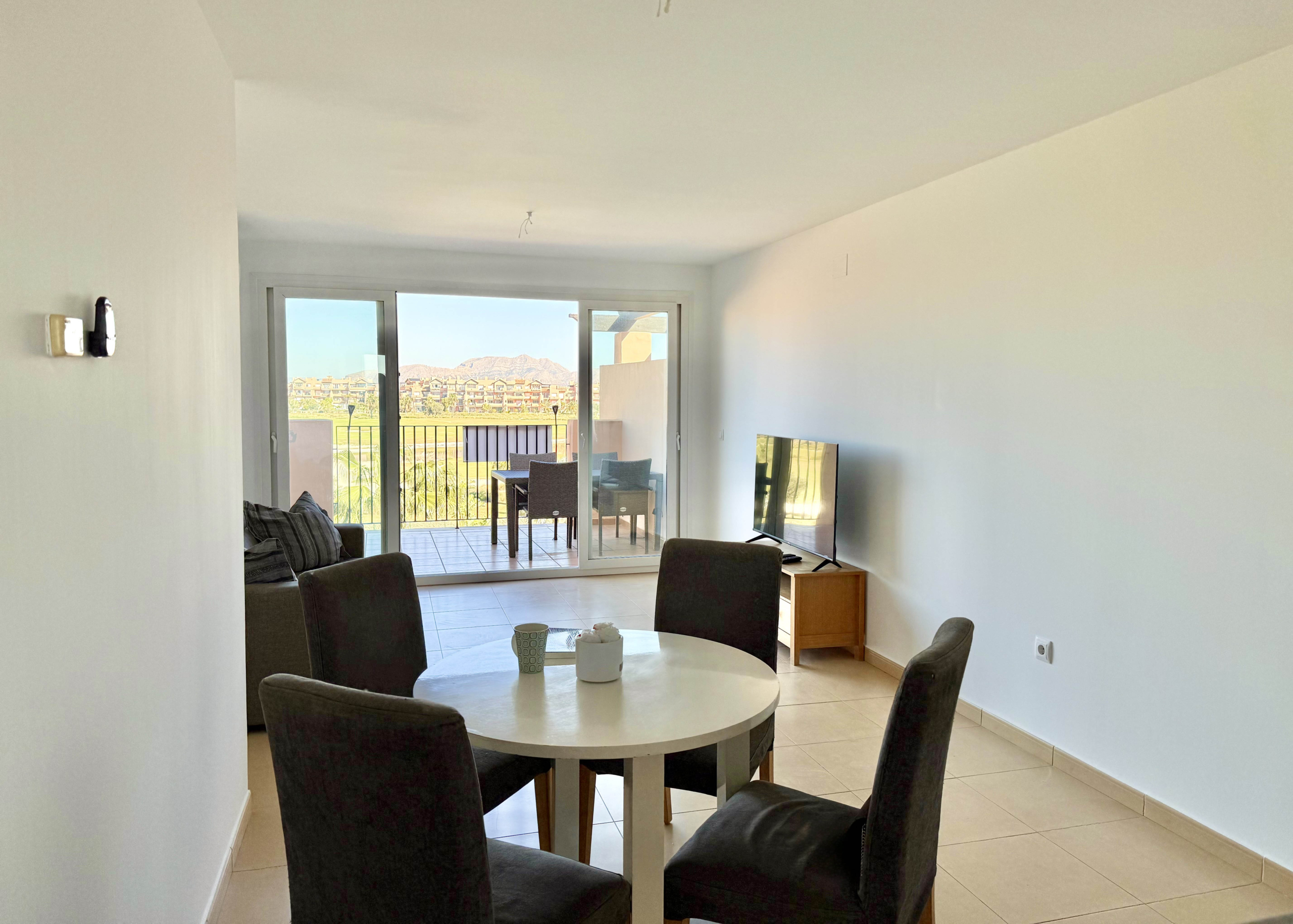 Bright open-plan living room in penthouse at Mar Menor Golf Resort by Levante Properties