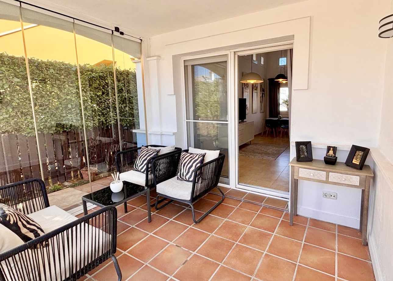 Enclosed terrace with glass curtains Mar Menor Golf Resort villa Levante Properties
