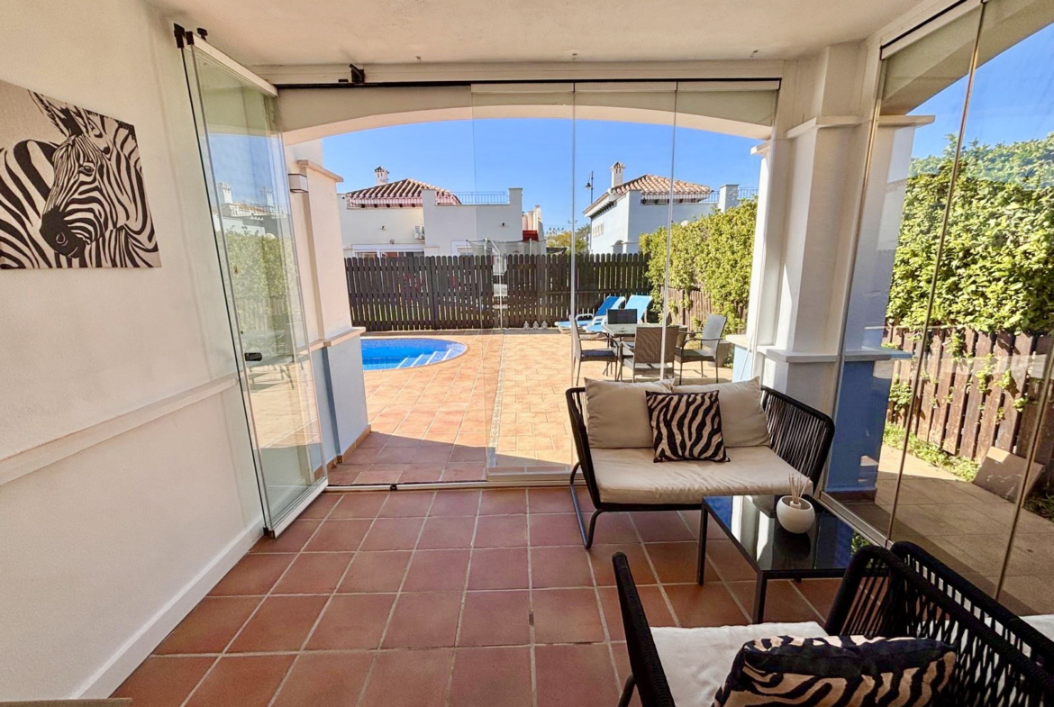 Enclosed terrace with glass curtains Mar Menor Golf Resort villa Levante Properties