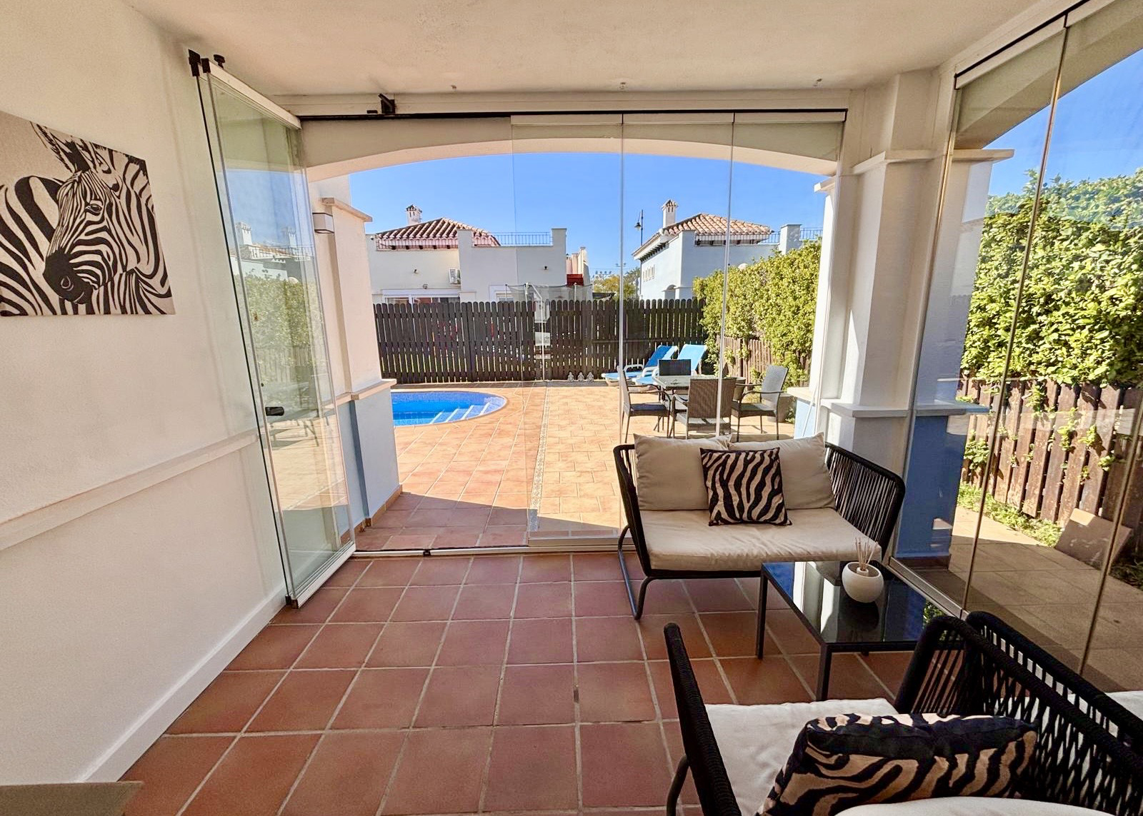Enclosed terrace with glass curtains Mar Menor Golf Resort villa Levante Properties