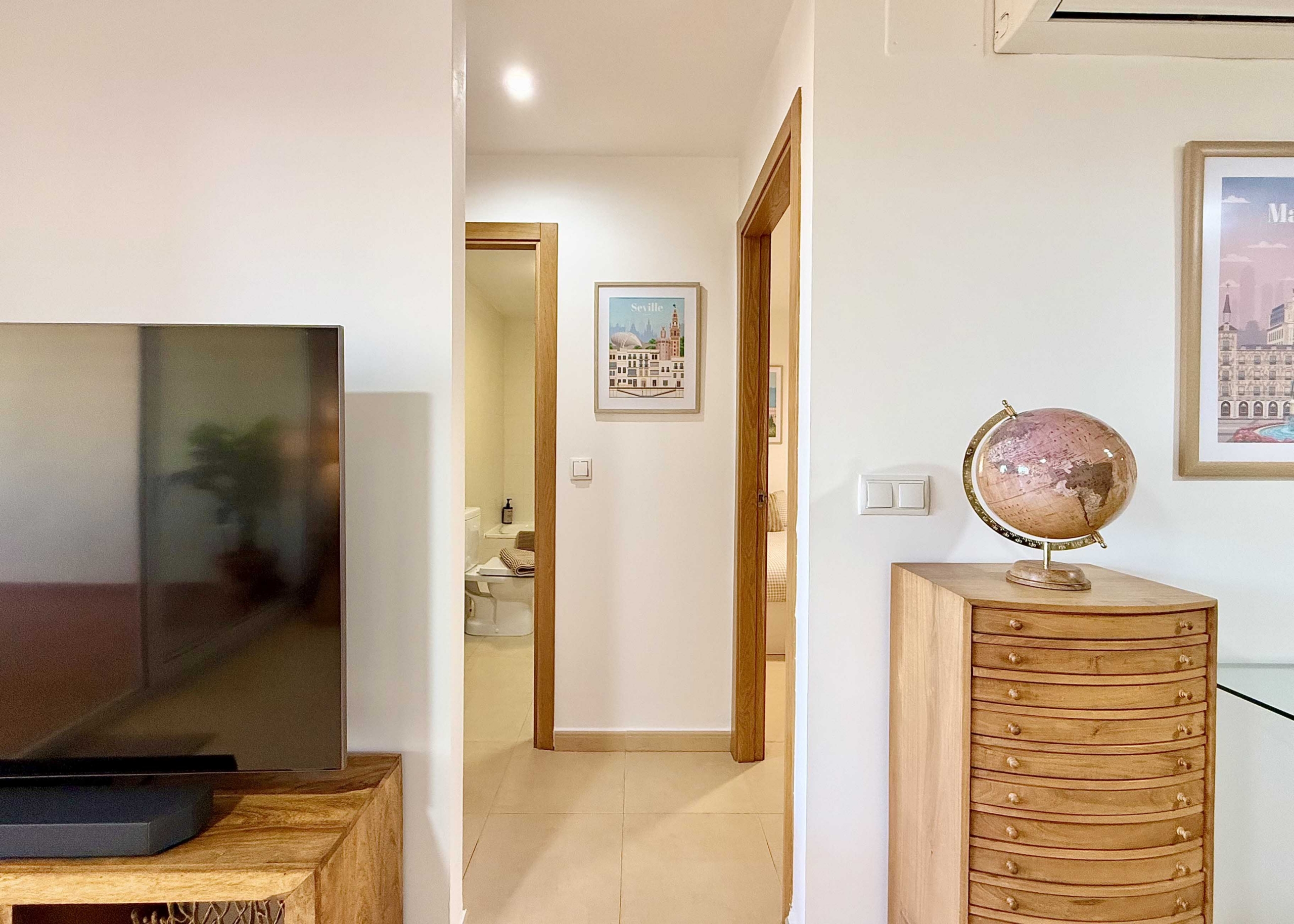 Bathroom and bedroom in Boulevard apartment for sale on Mar Menor Golf Resort by Levante Properties