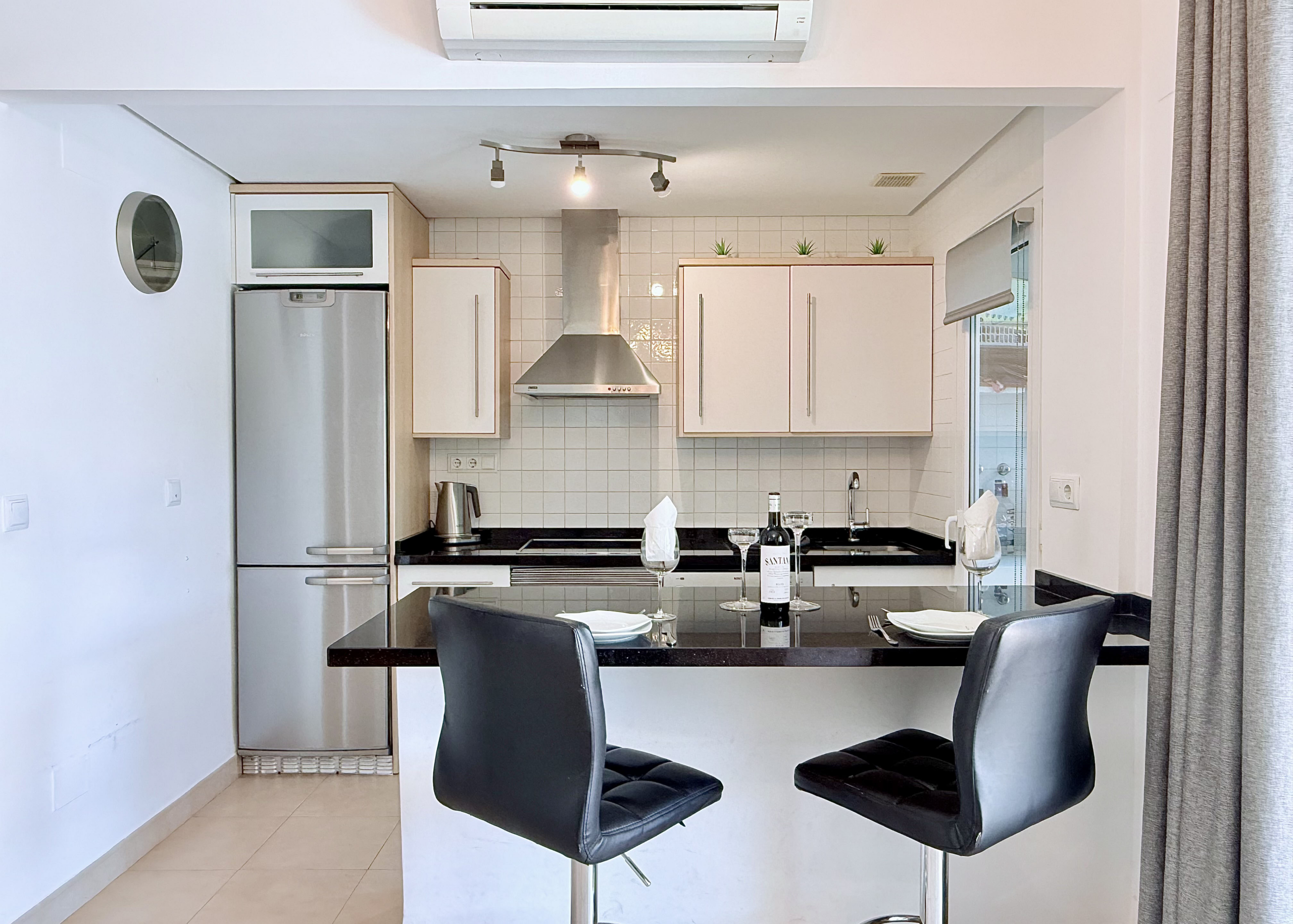 Open plan kitchen and dining area in Isla Grosa villa on Mar Menor Golf Resort by Levante Properties