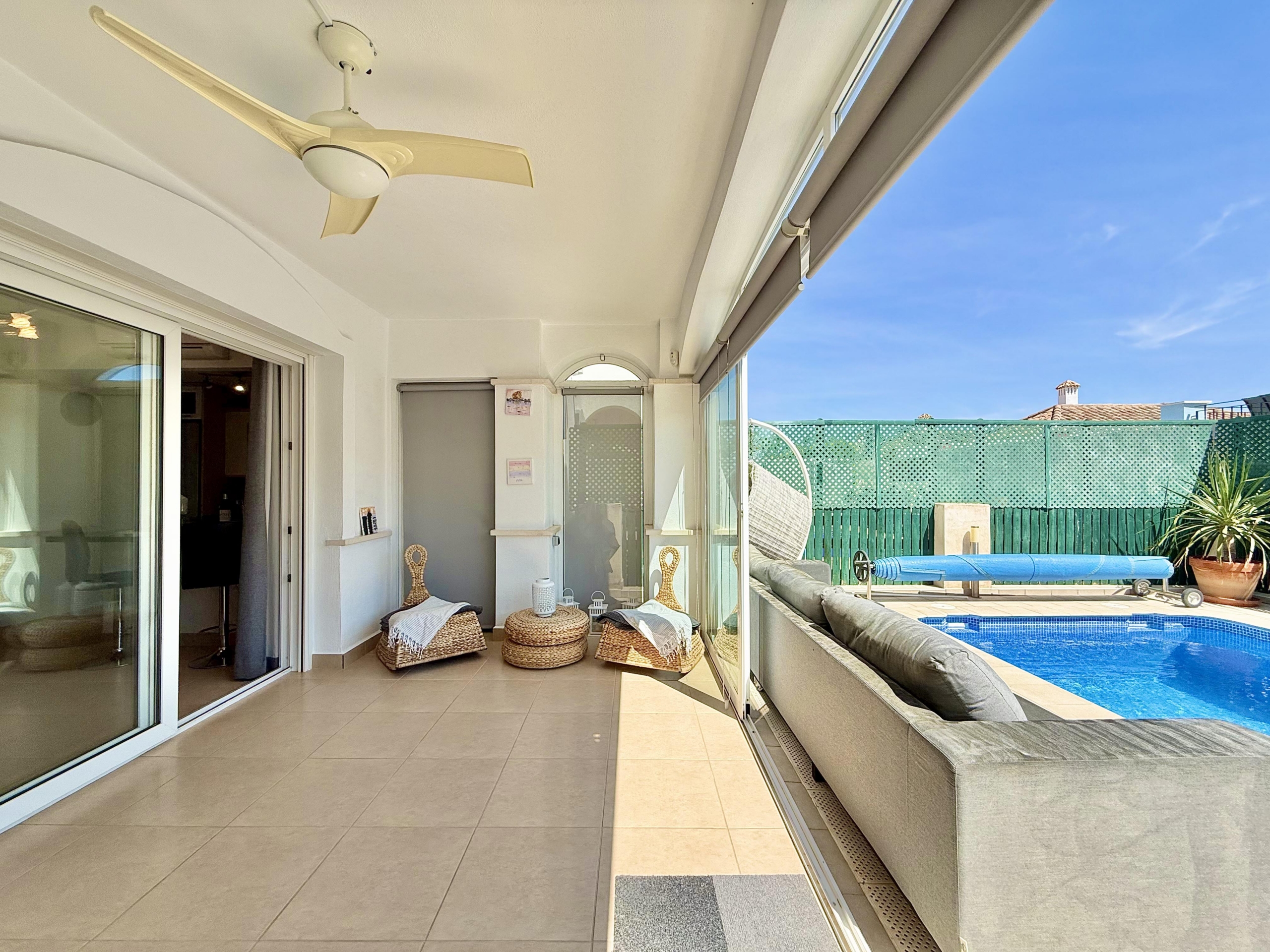 Enclosed terrace and sun lounge at Isla Grosa villa on Mar Menor Golf Resort