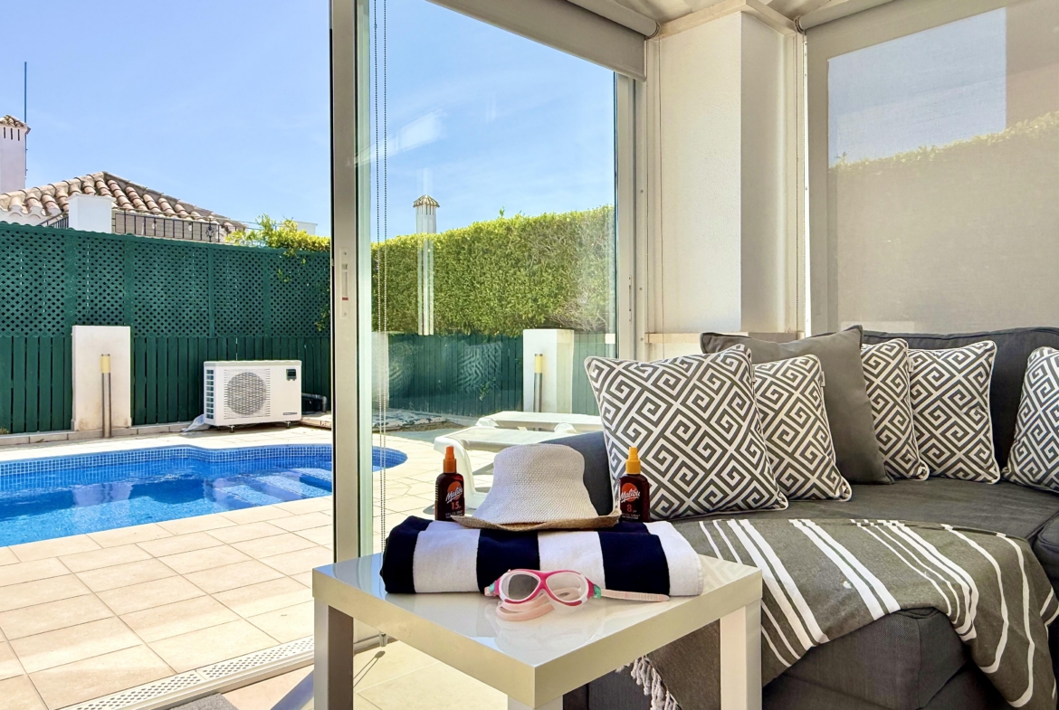 Enclosed terrace and sun lounge at Isla Grosa villa on Mar Menor Golf Resort