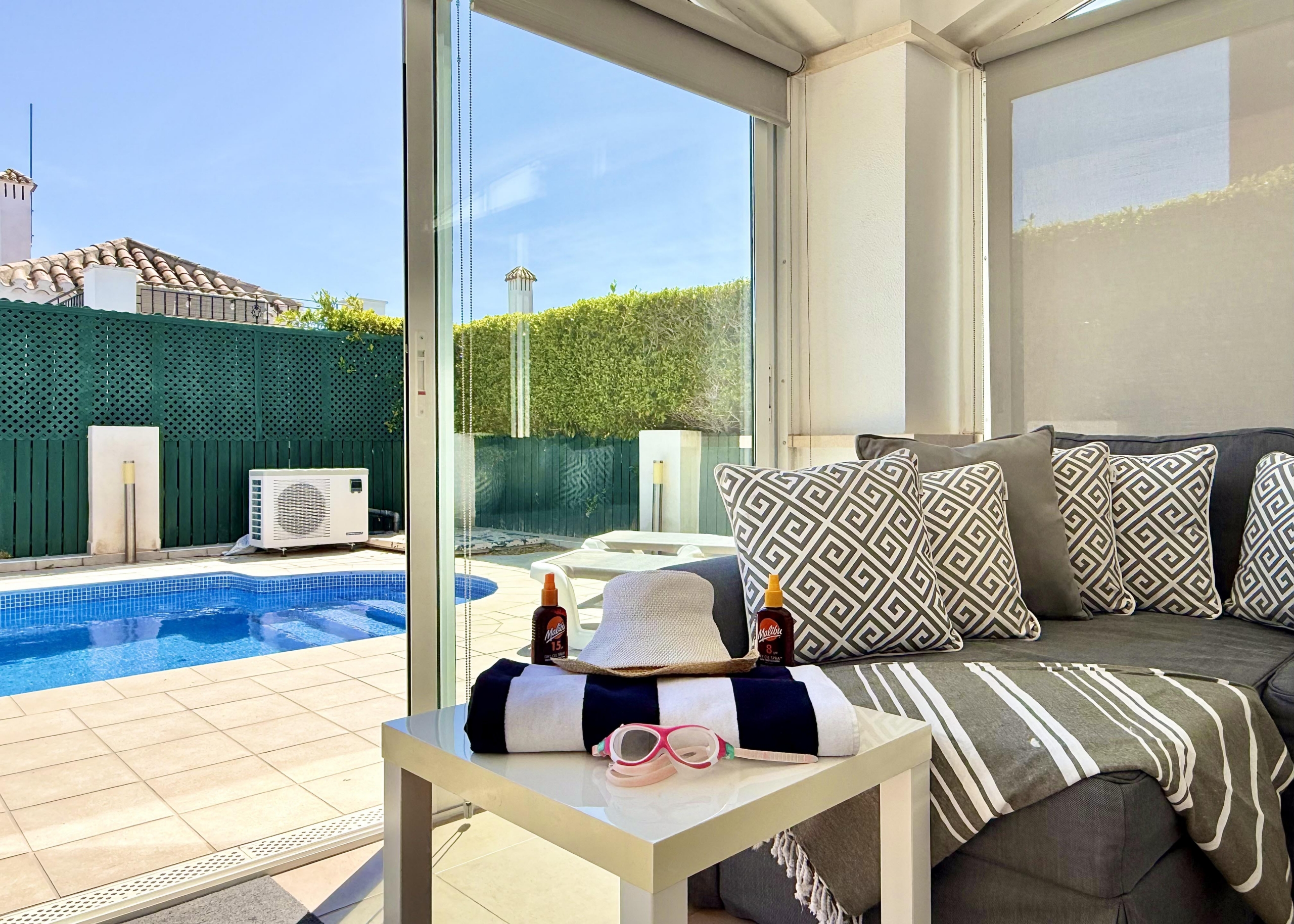 Enclosed terrace and sun lounge at Isla Grosa villa on Mar Menor Golf Resort