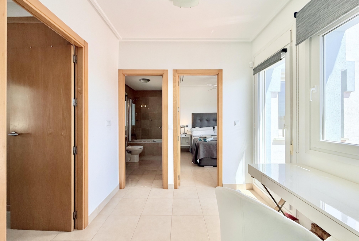 Bright first floor landing with terrace access in Isla Grosa villa on Mar Menor Golf Resort