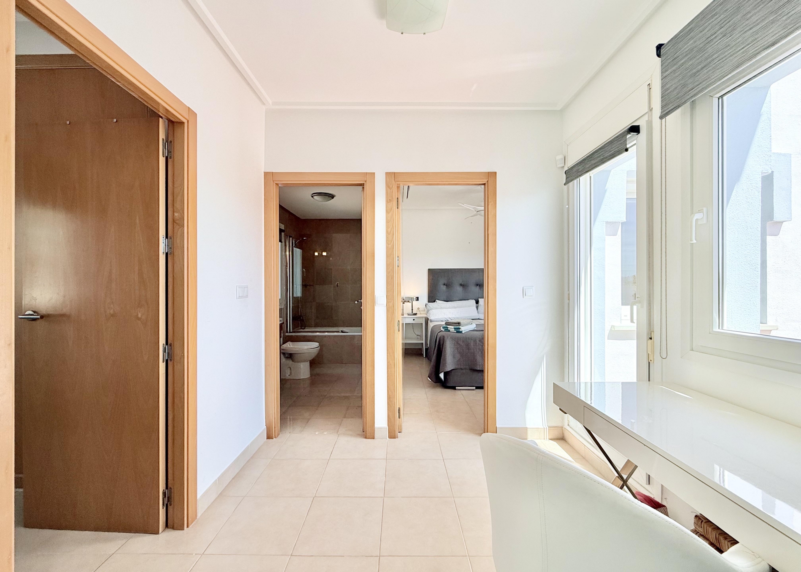 Bright first floor landing with terrace access in Isla Grosa villa on Mar Menor Golf Resort