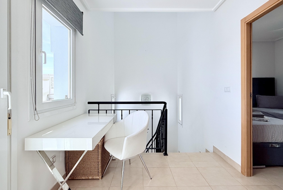 Bright first floor landing with terrace access in Isla Grosa villa on Mar Menor Golf Resort