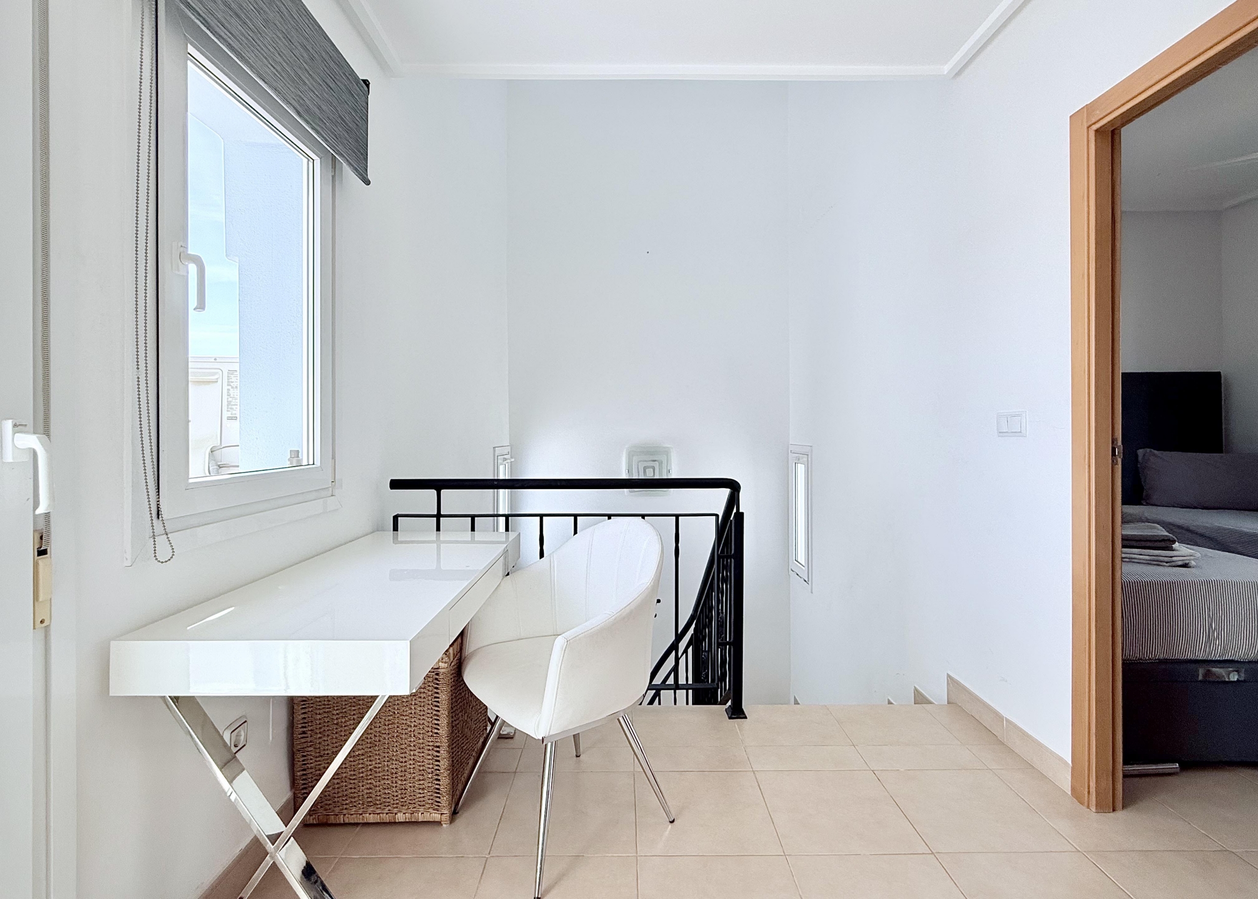 Bright first floor landing with terrace access in Isla Grosa villa on Mar Menor Golf Resort