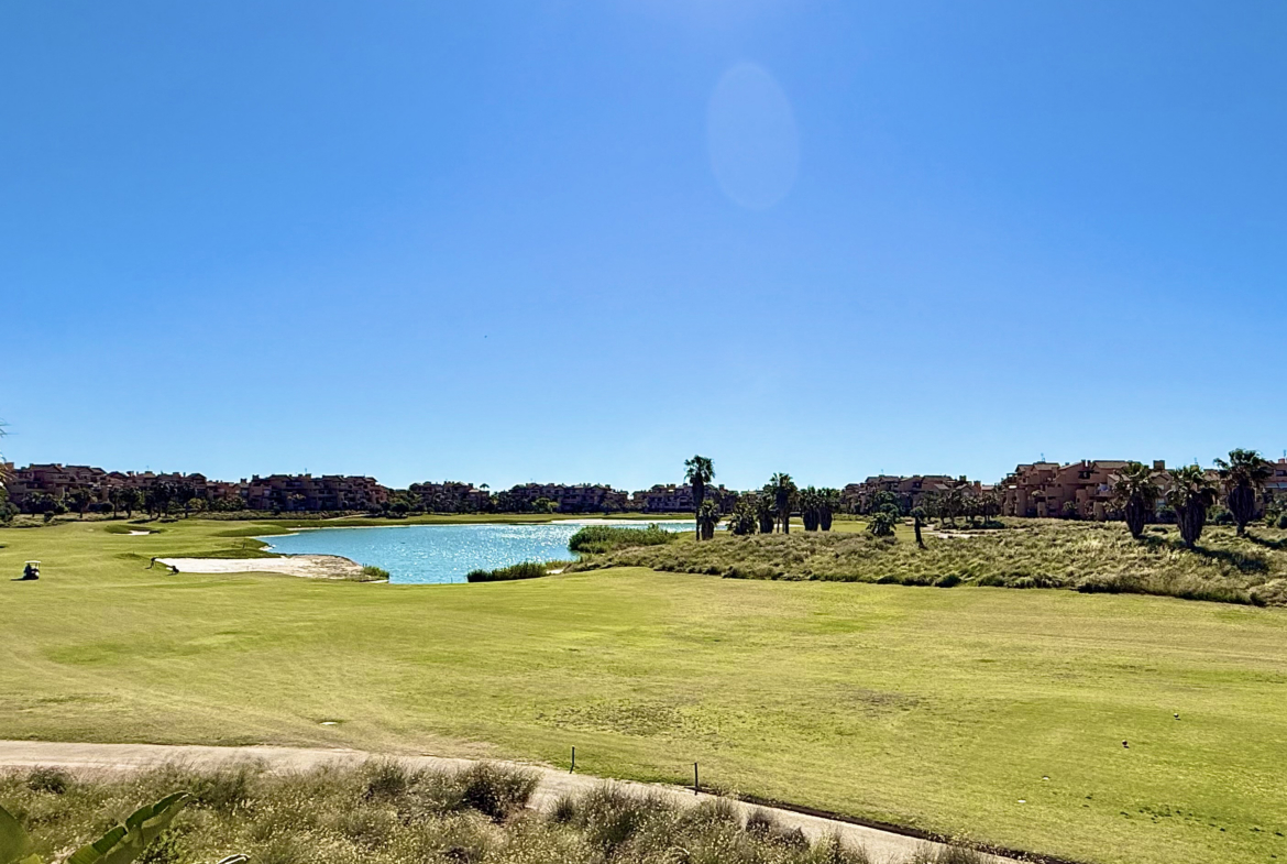 Panoramic golf and lake views from south-facing apartment on Mar Menor Golf Resort