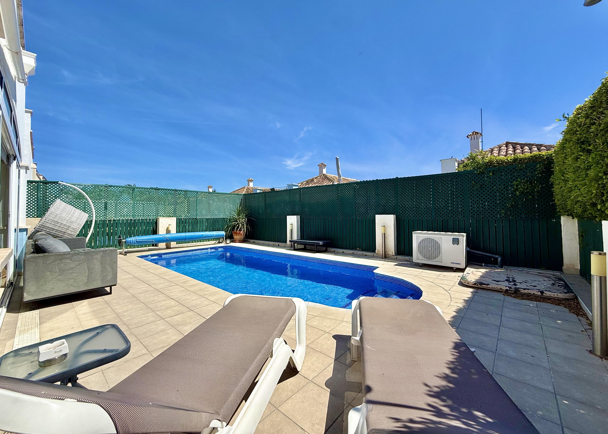 Private heated swimming pool at Isla Grosa villa on Mar Menor Golf Resort by Levante Properties