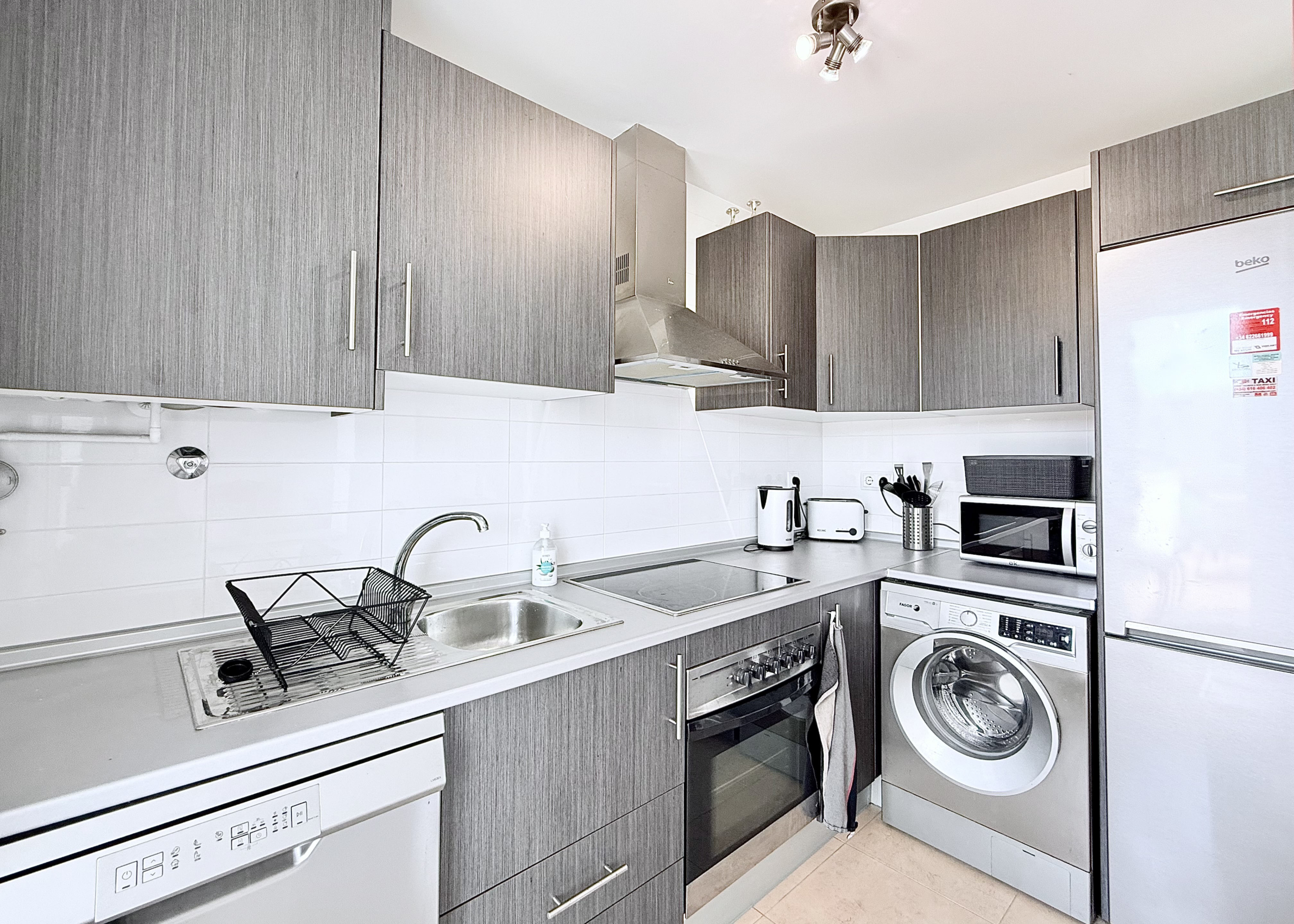 Modern kitchen in Calblanque villa at Mar Menor Golf Resort