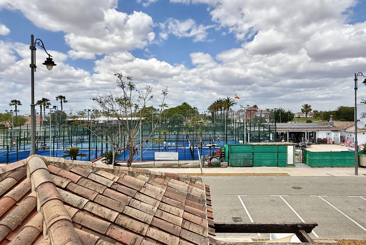 Private rooftop solarium with views of the Padel Club at Mar Menor Golf Resort villa by Levante Properties