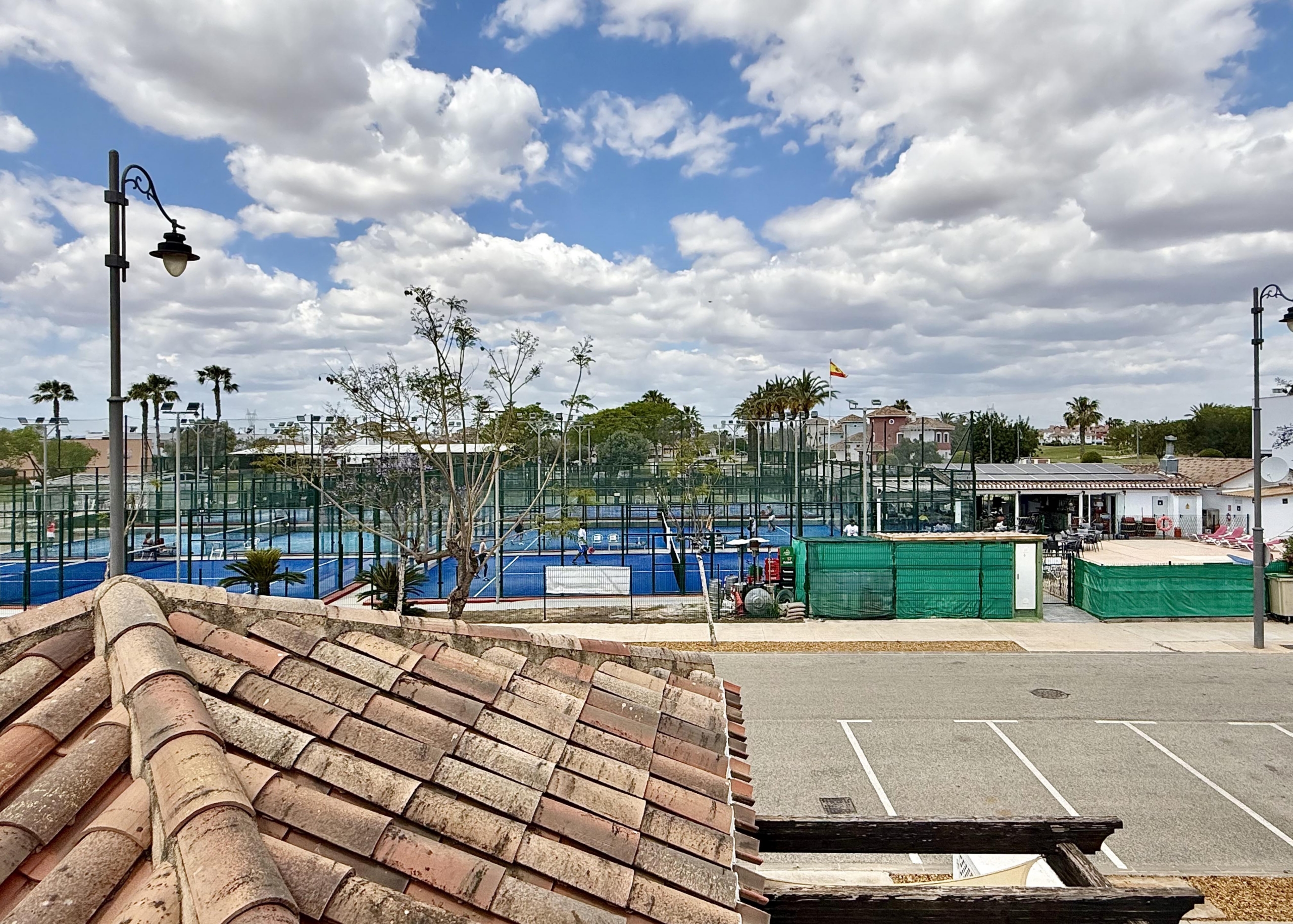 Private rooftop solarium with views of the Padel Club at Mar Menor Golf Resort villa by Levante Properties