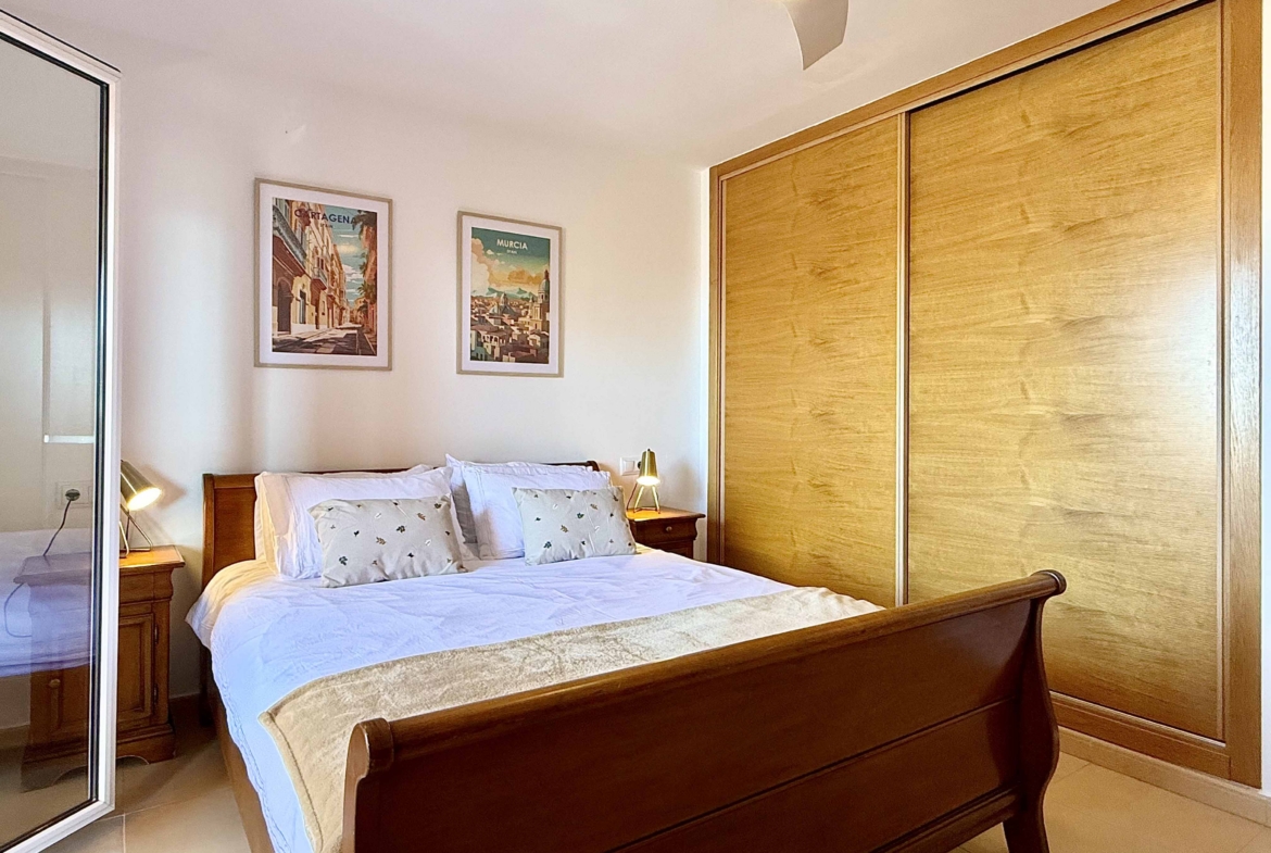 Master bedroom with terrace access in Mar Menor Golf Resort apartment