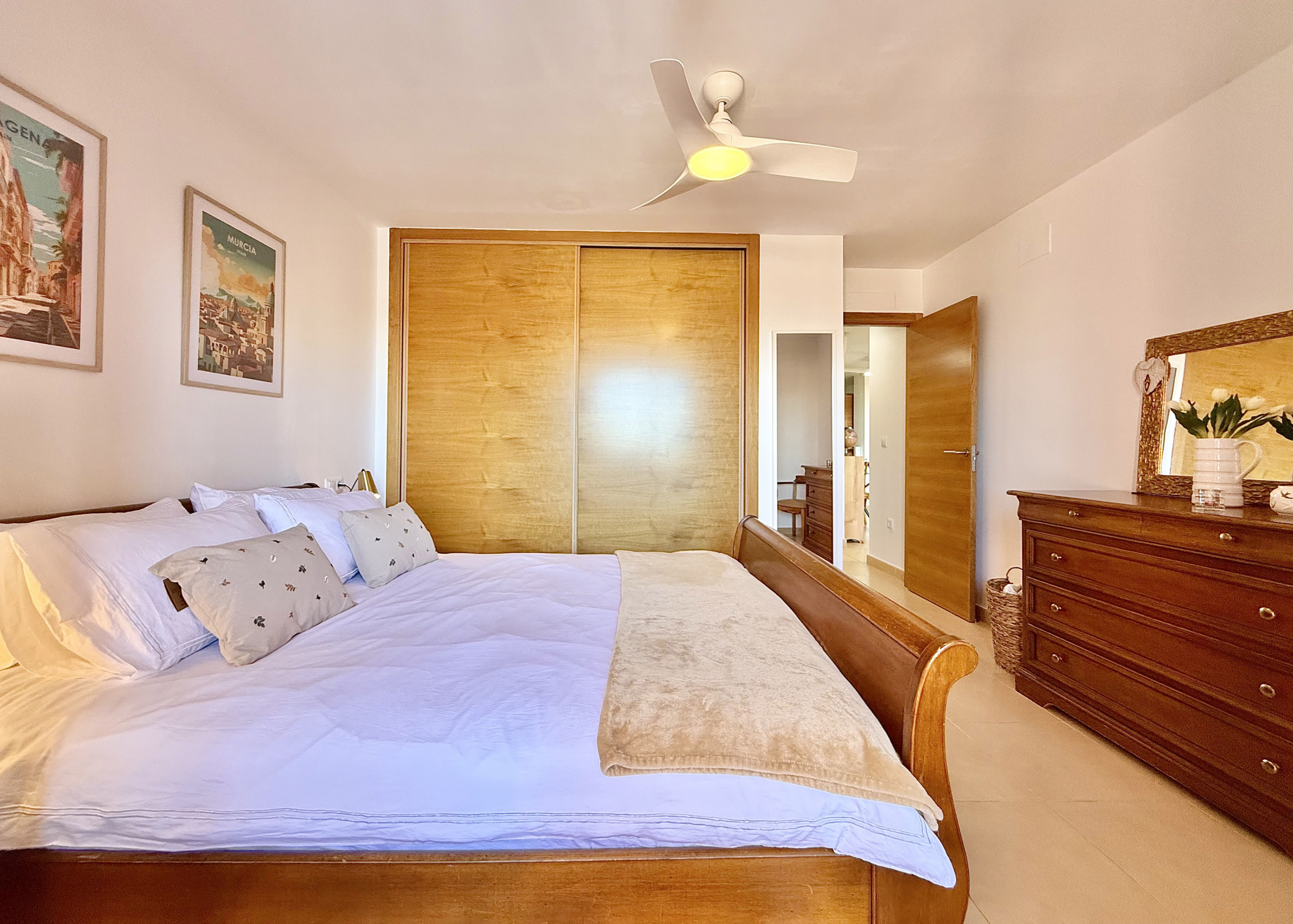 Master bedroom with terrace access in Mar Menor Golf Resort apartment