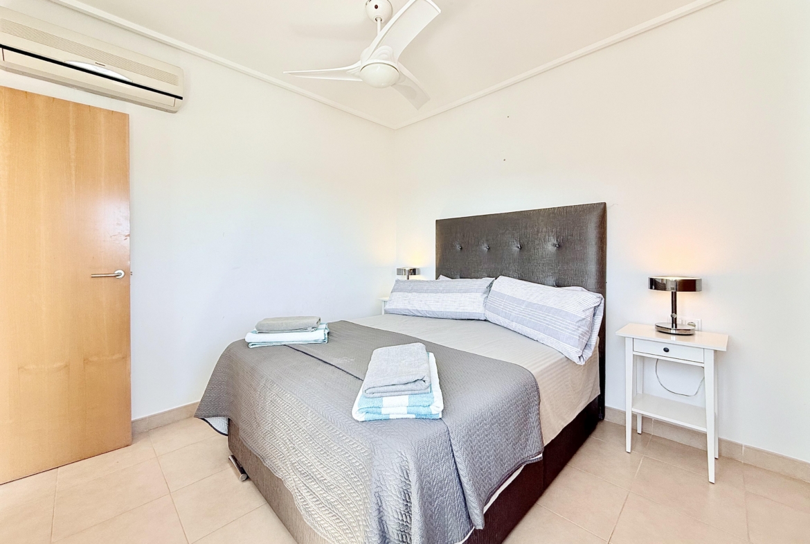 Master bedroom with fitted wardrobes in Isla Grosa villa on Mar Menor Golf Resort