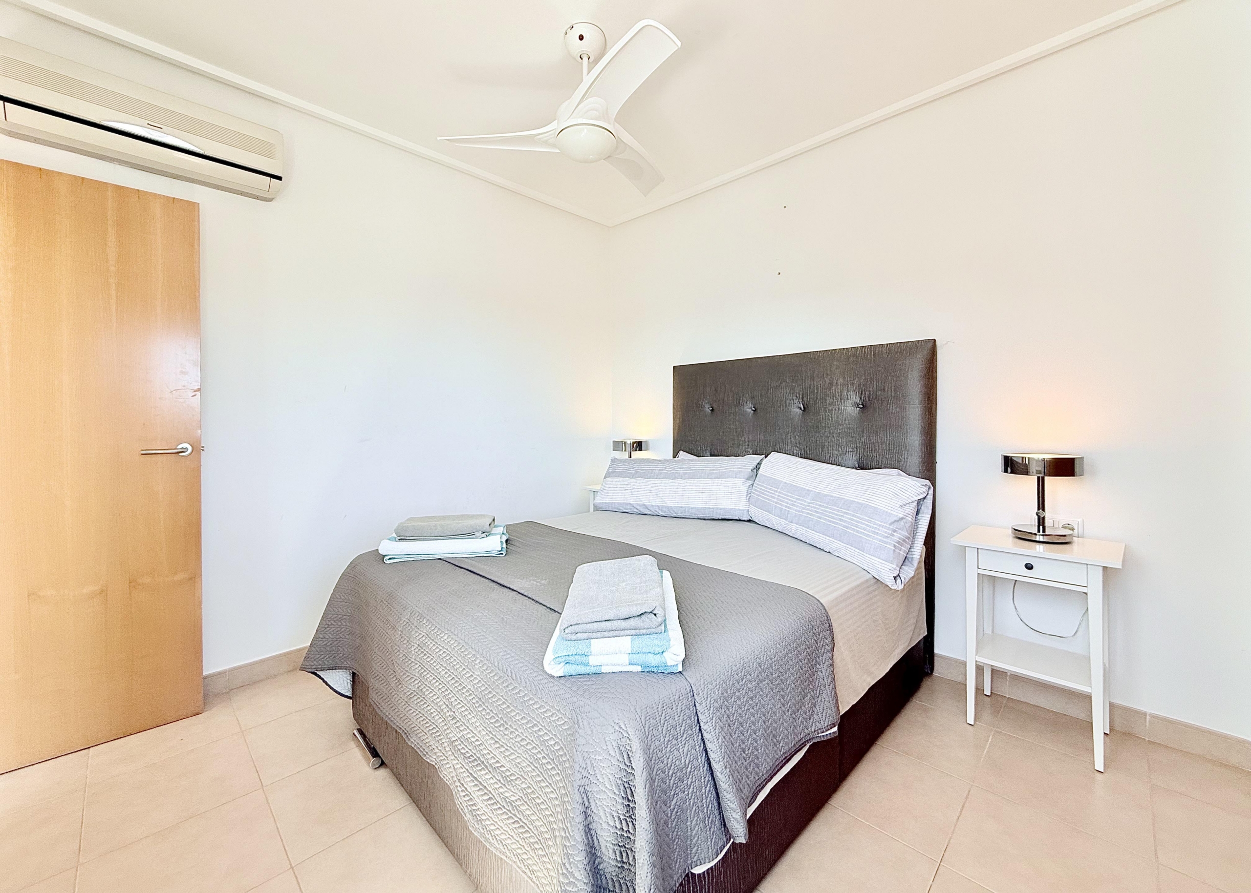 Master bedroom with fitted wardrobes in Isla Grosa villa on Mar Menor Golf Resort