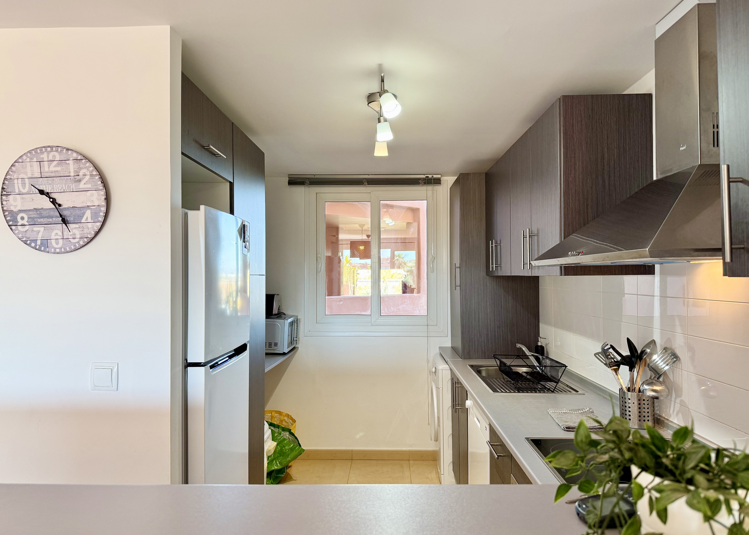 Modern kitchen in south-facing apartment on Mar Menor Golf Resort by Levante Properties