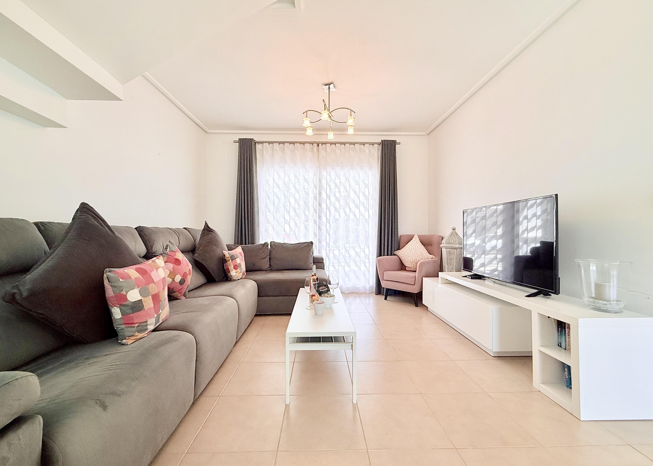 Modern open plan living room in Isla Grosa villa on Mar Menor Golf Resort