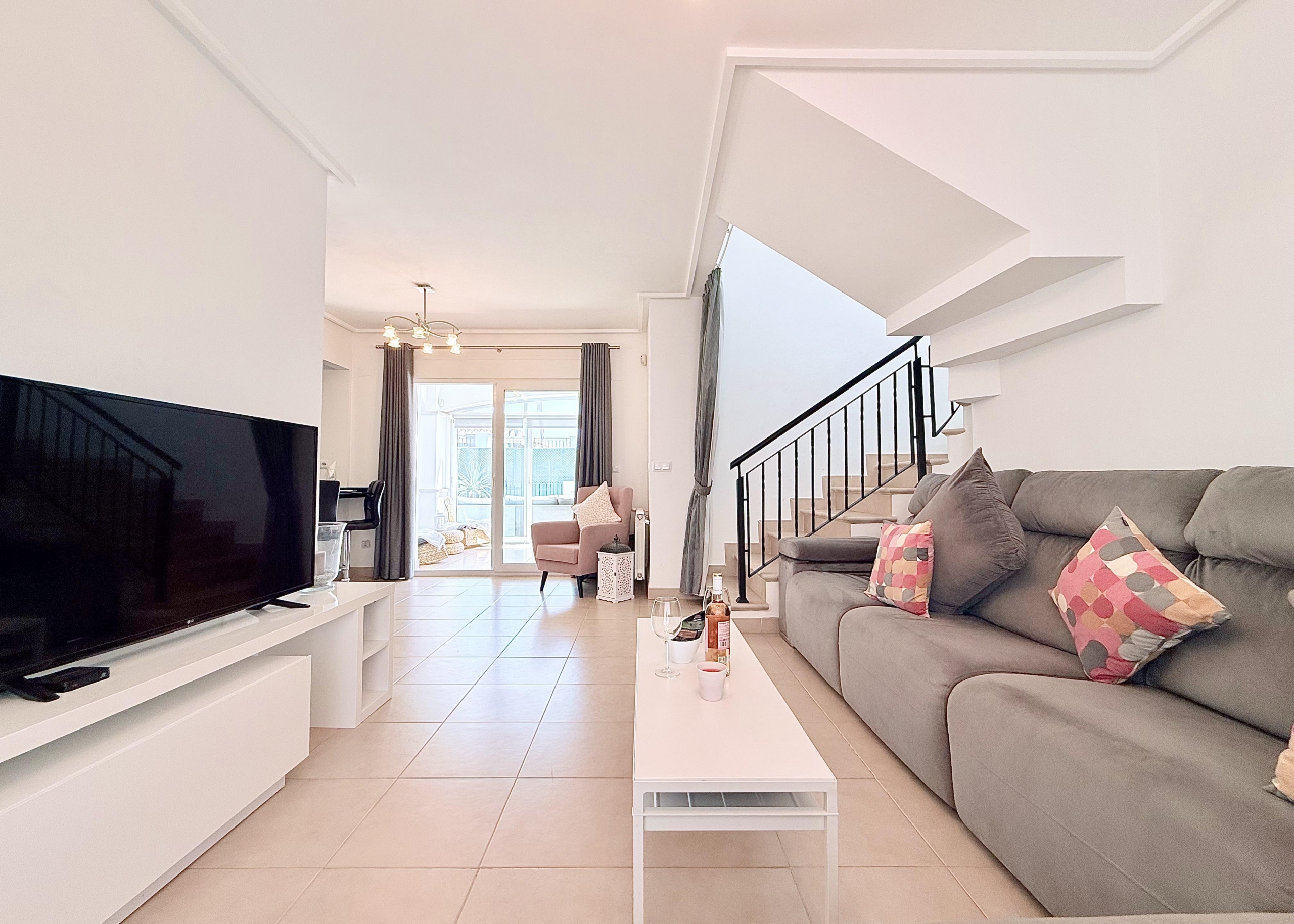 Modern open plan living room in Isla Grosa villa on Mar Menor Golf Resort