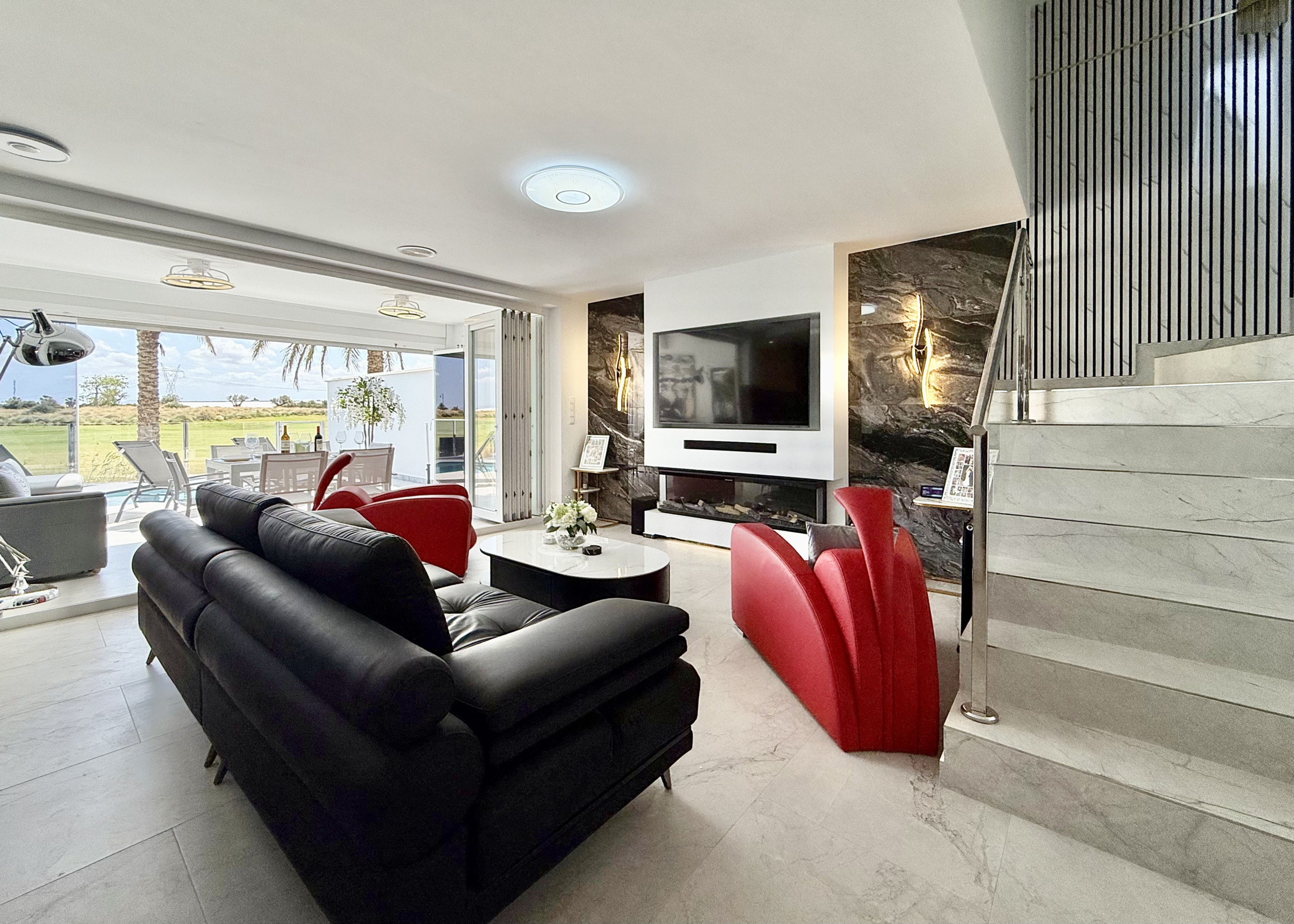 Contemporary living room in luxury Mar Menor Golf Resort villa listed by Cristina Lopez