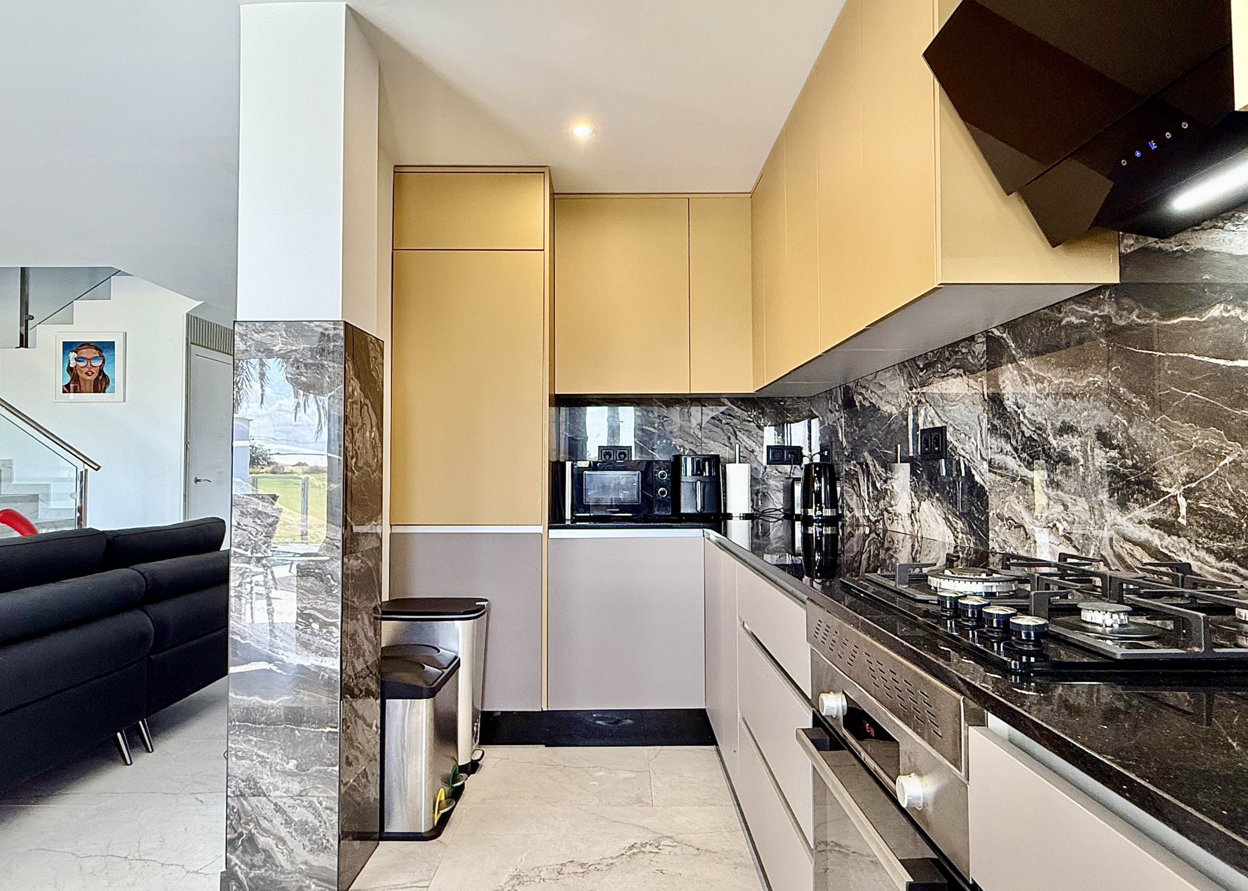 Designer kitchen with granite worktops in Mar Menor Golf Resort property by Levante Properties