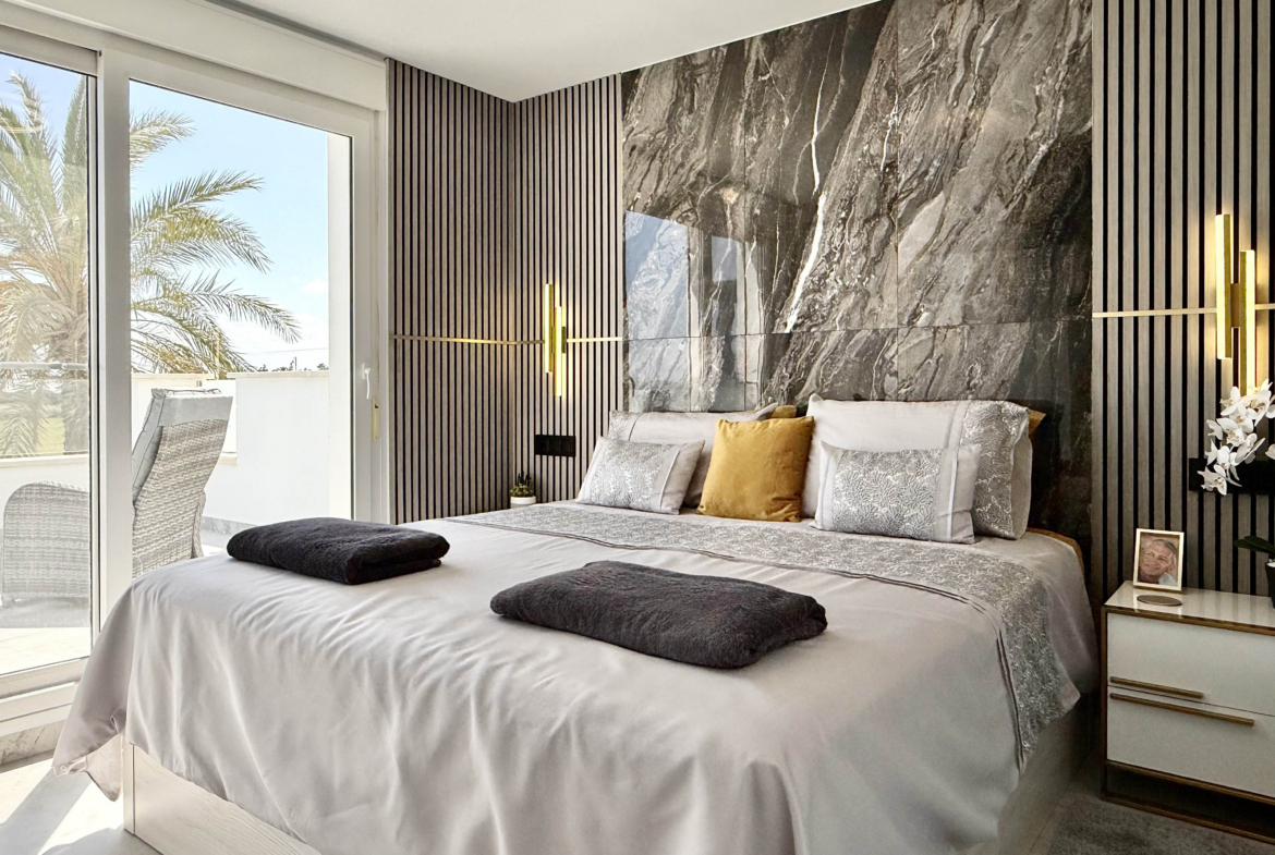 Luxury master bedroom with private terrace in Calblanque Villa at Mar Menor Golf Resort